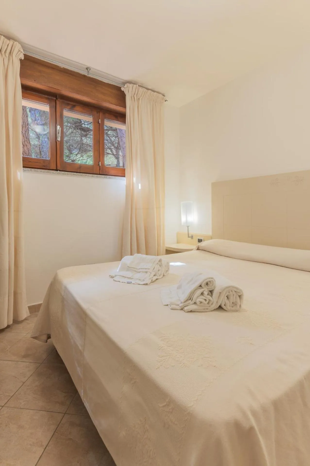 Bed in Club Hotel Residence Baiaverde