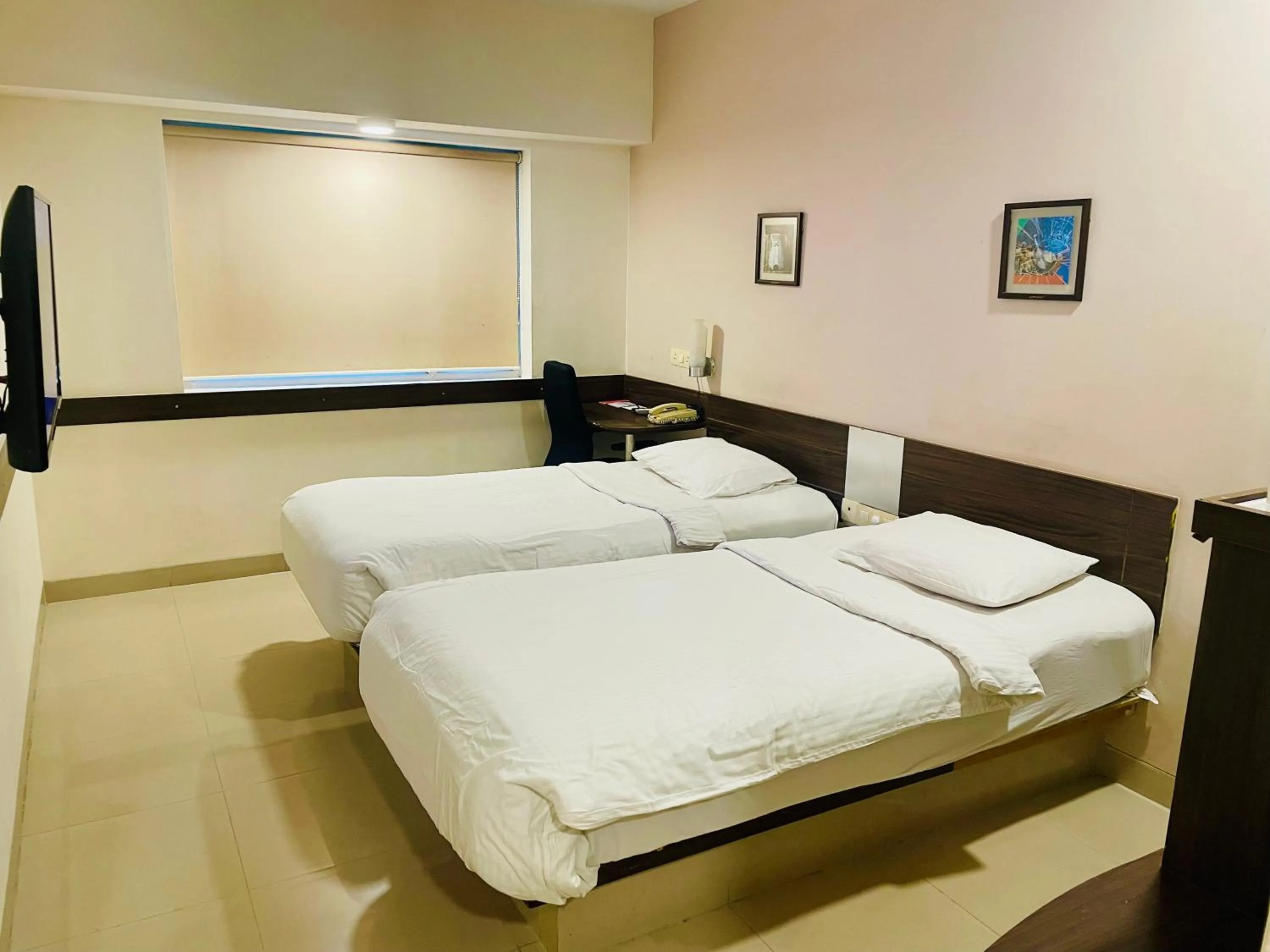 Photo of the whole room, Bed in Ginger Trivandrum