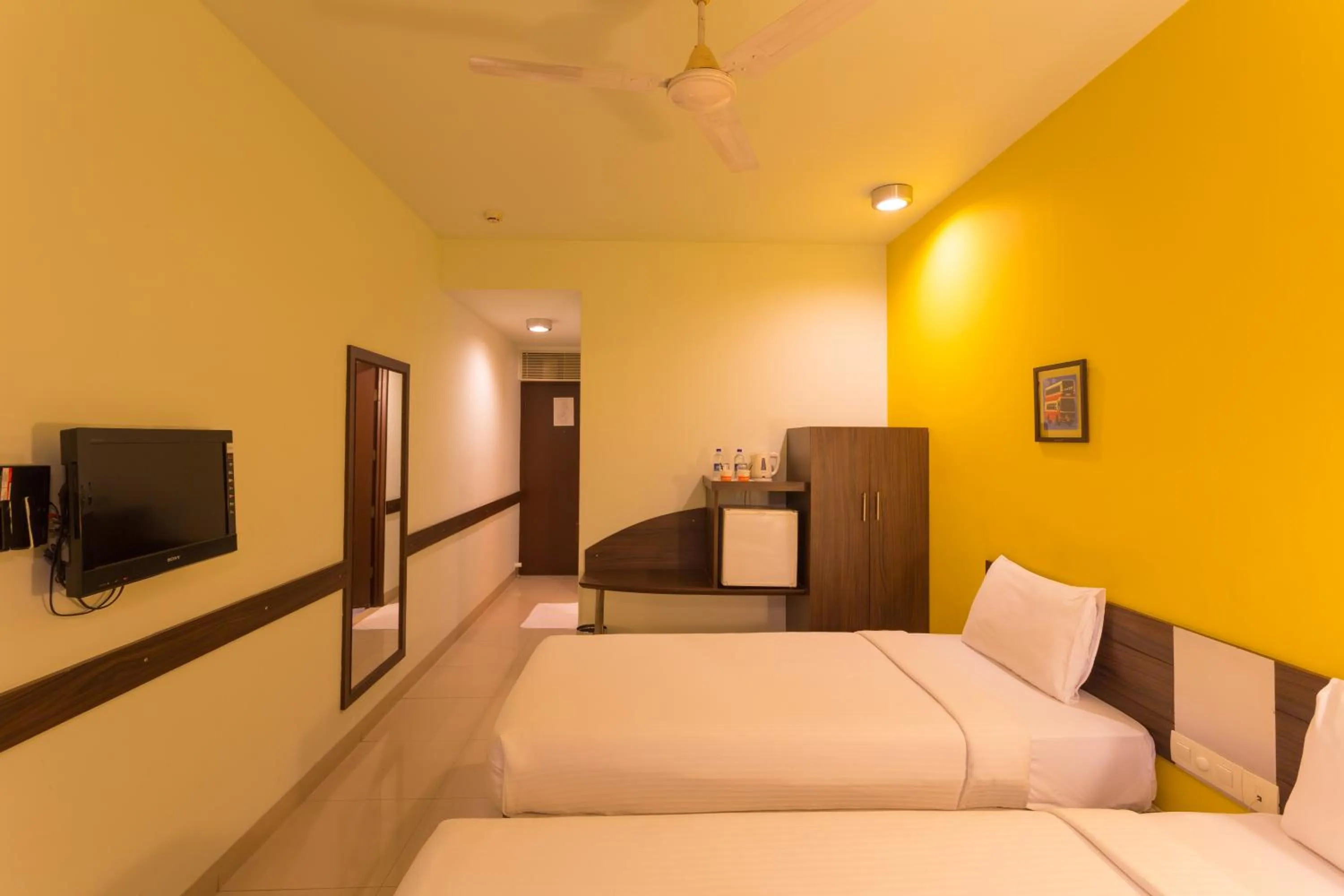 Photo of the whole room, Bed in Ginger Trivandrum