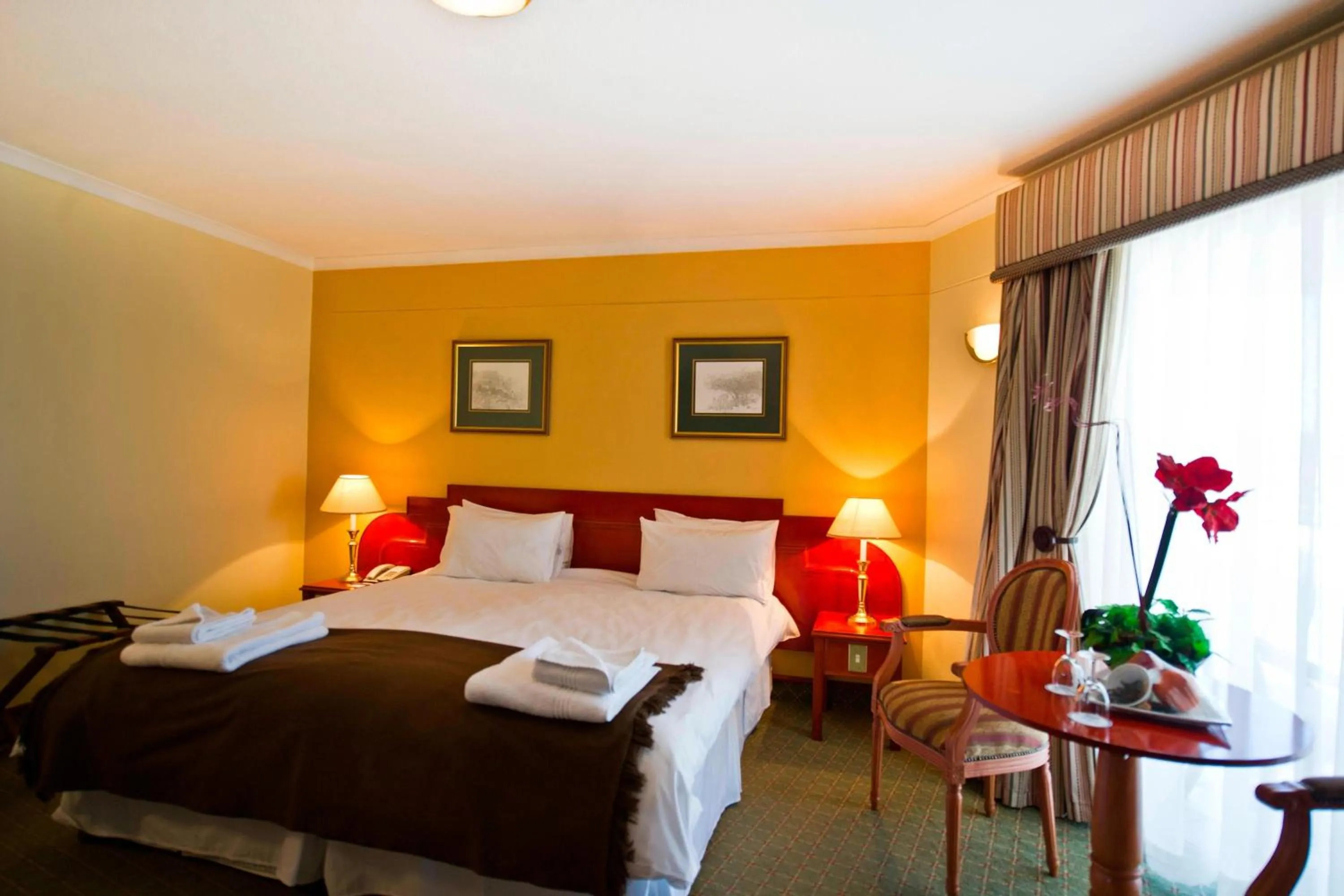 Photo of the whole room, Bed in Protea Hotel by Marriott Windhoek Furstenhof