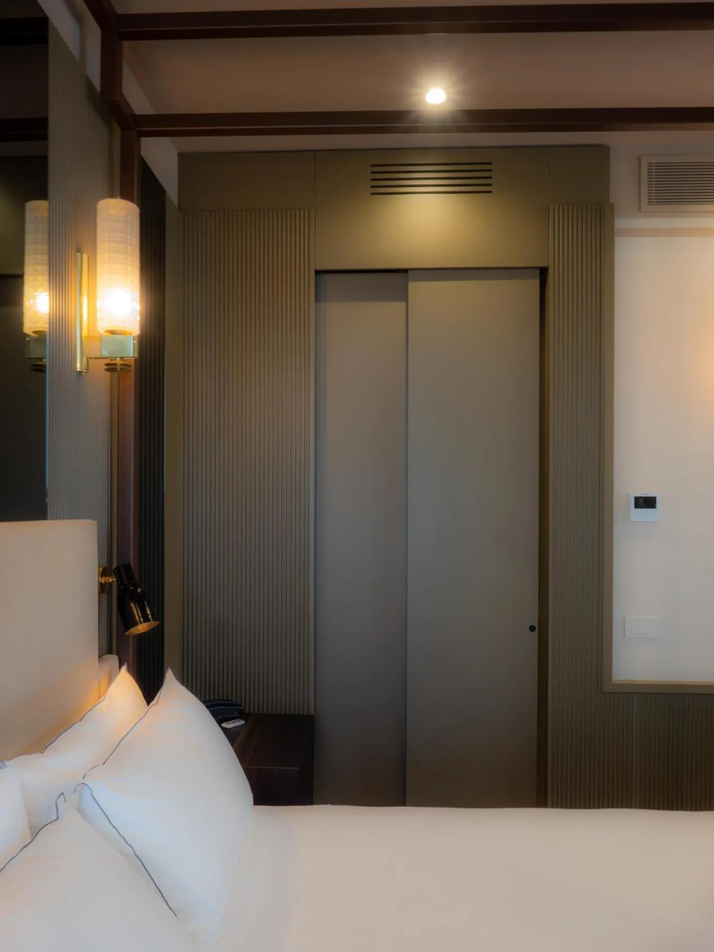 Bed in The Glam Boutique Hotel & Apt