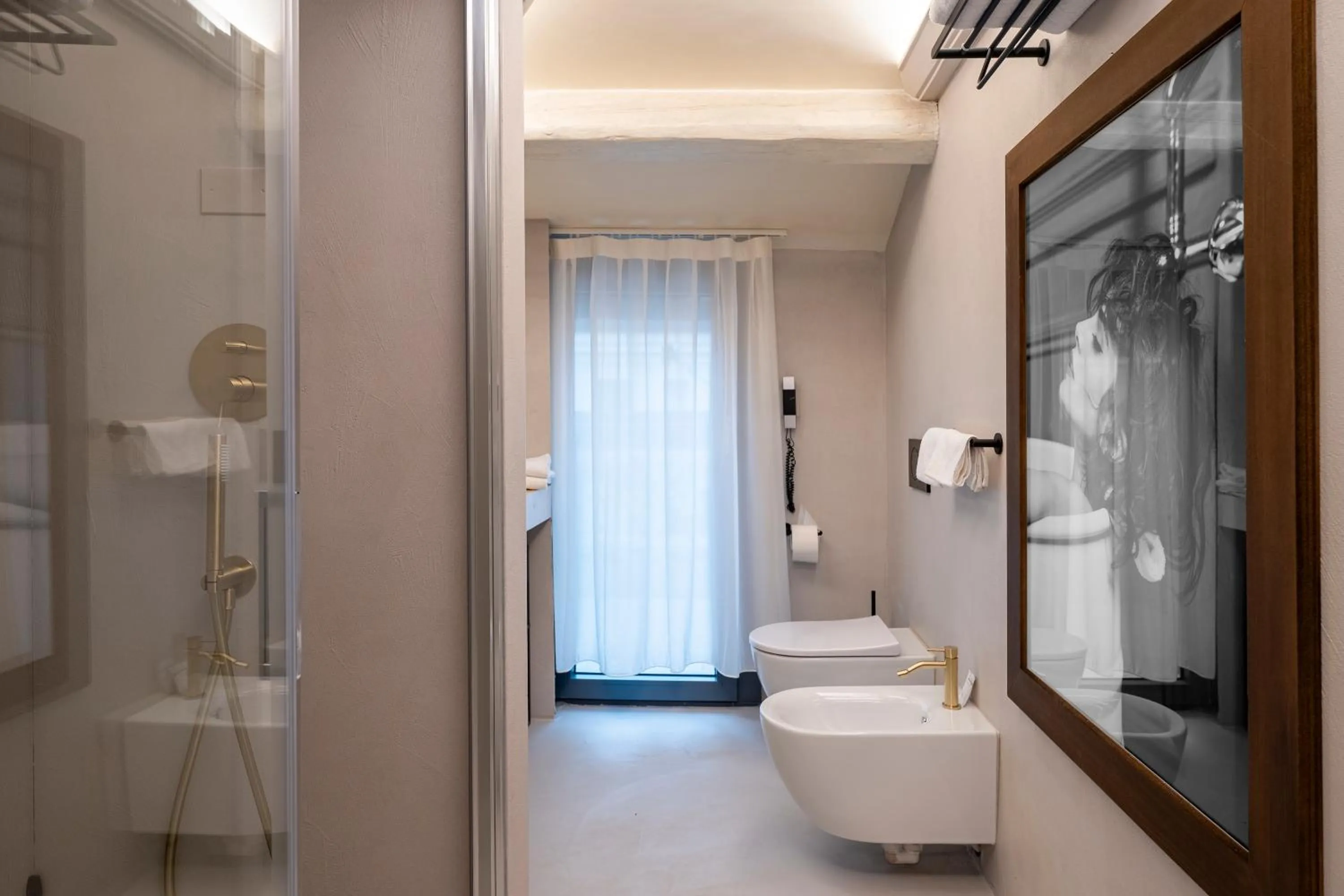 Shower in The Glam Boutique Hotel & Apt