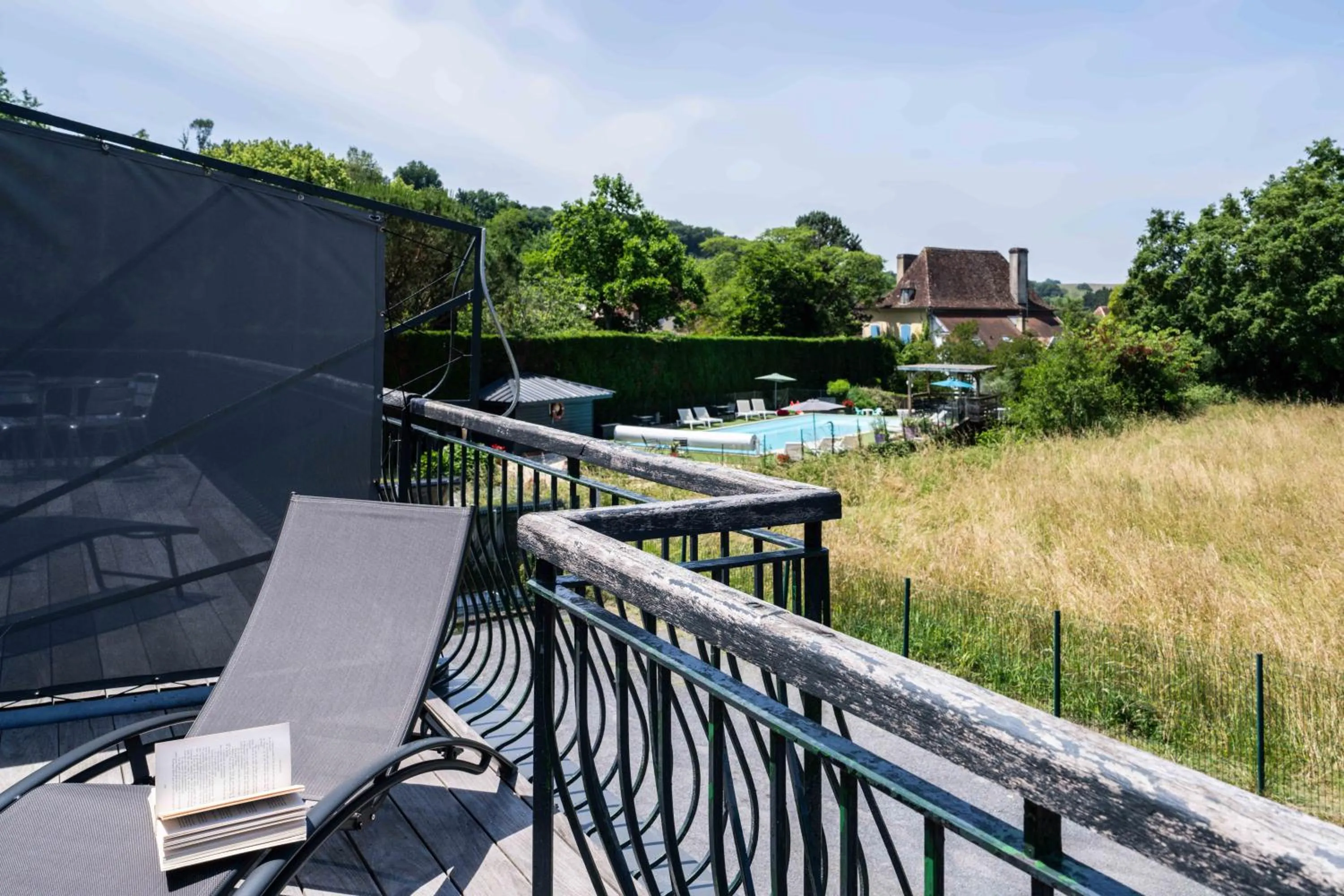 Garden view in Logis Auberge du Relais - Hôtel & Restaurant