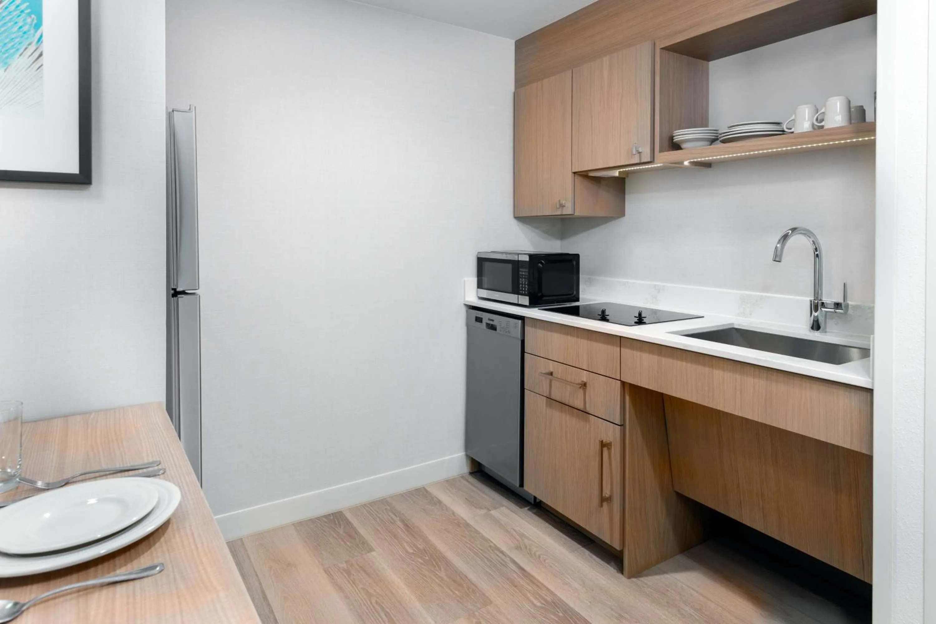 Kitchen or kitchenette in Homewood Suites by Hilton Orlando-Nearest to Universal Studios