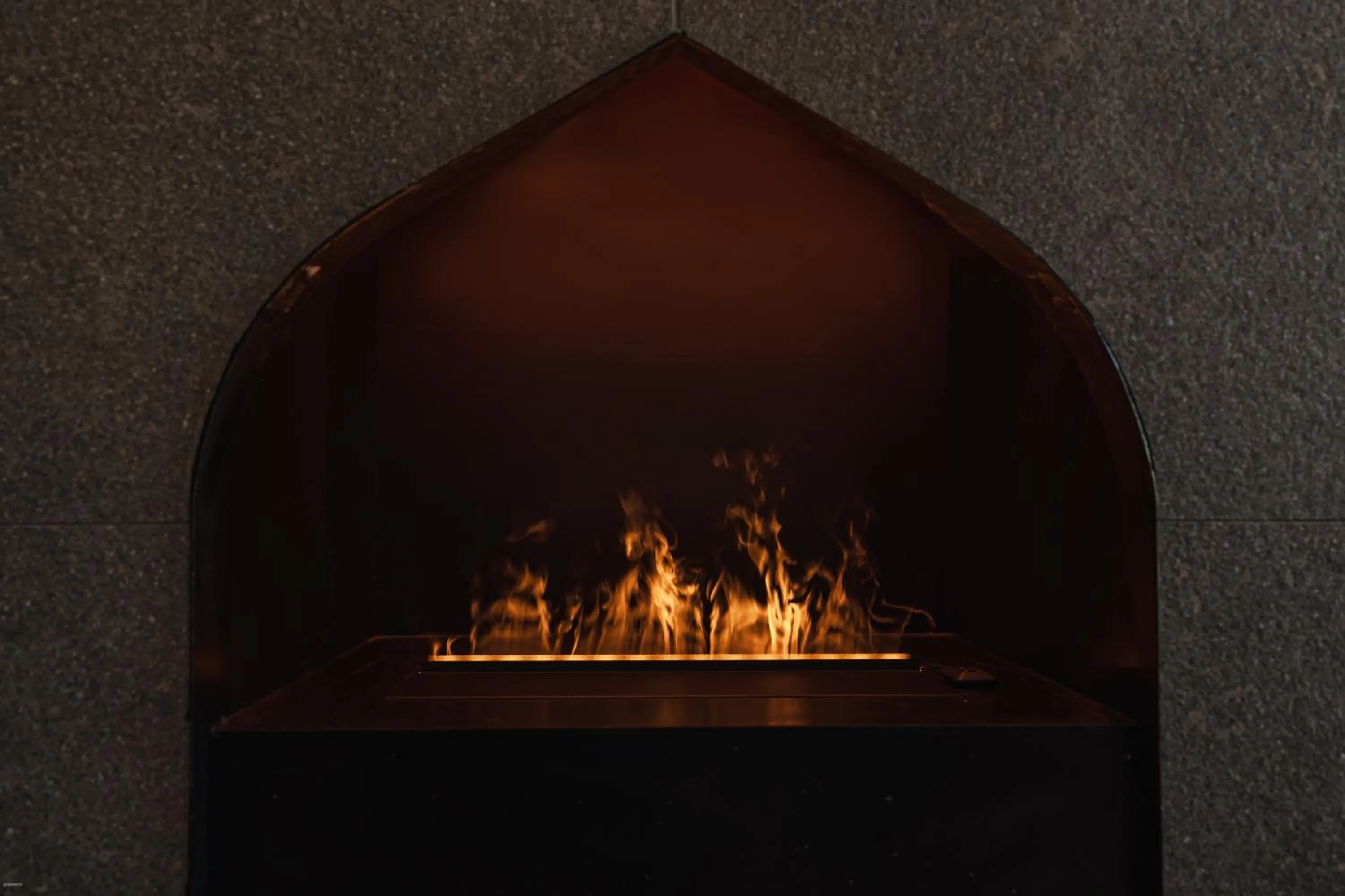 fireplace in Latemar - Hotel Suites Spa