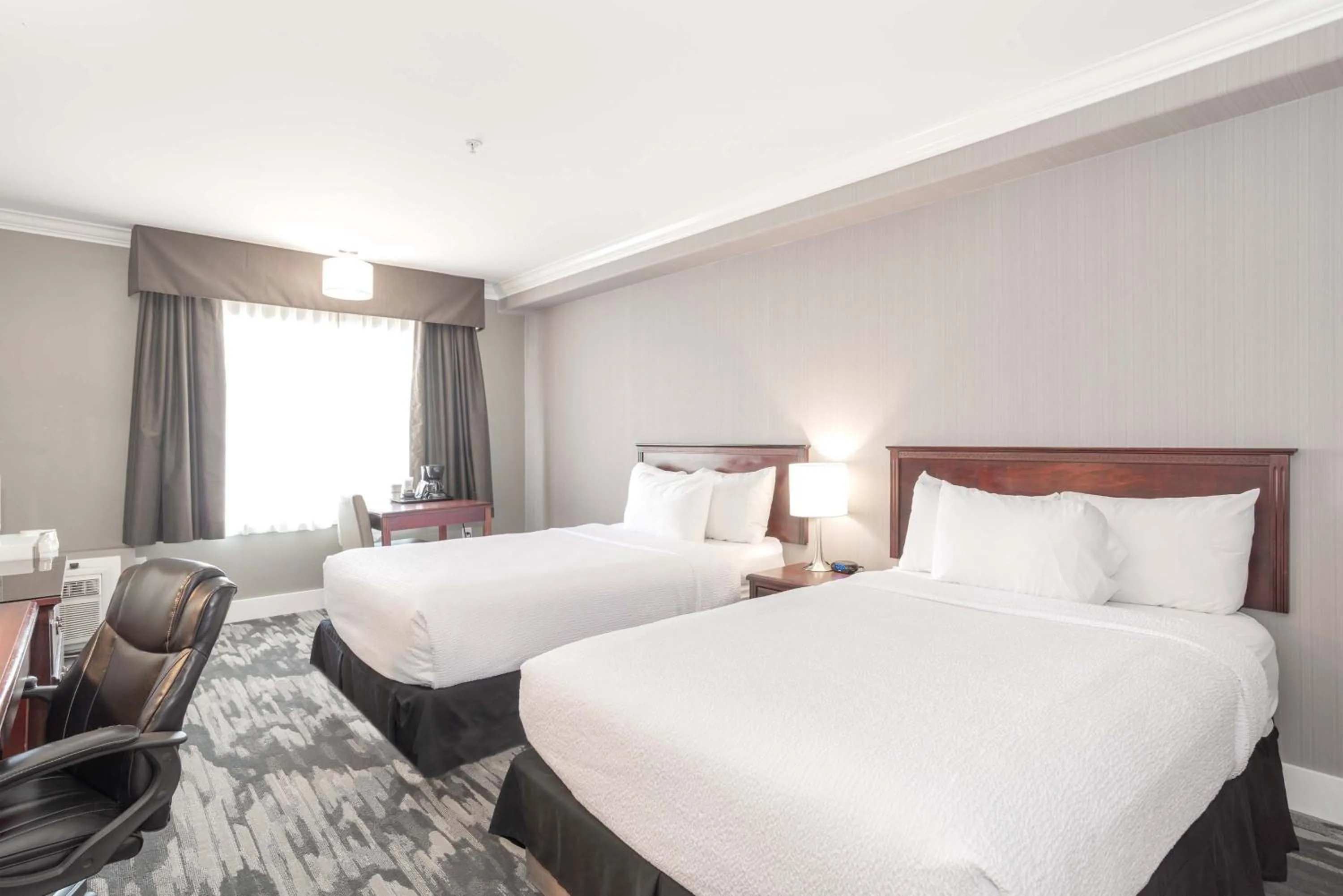 Photo of the whole room, Bed in Sandman Hotel Saskatoon