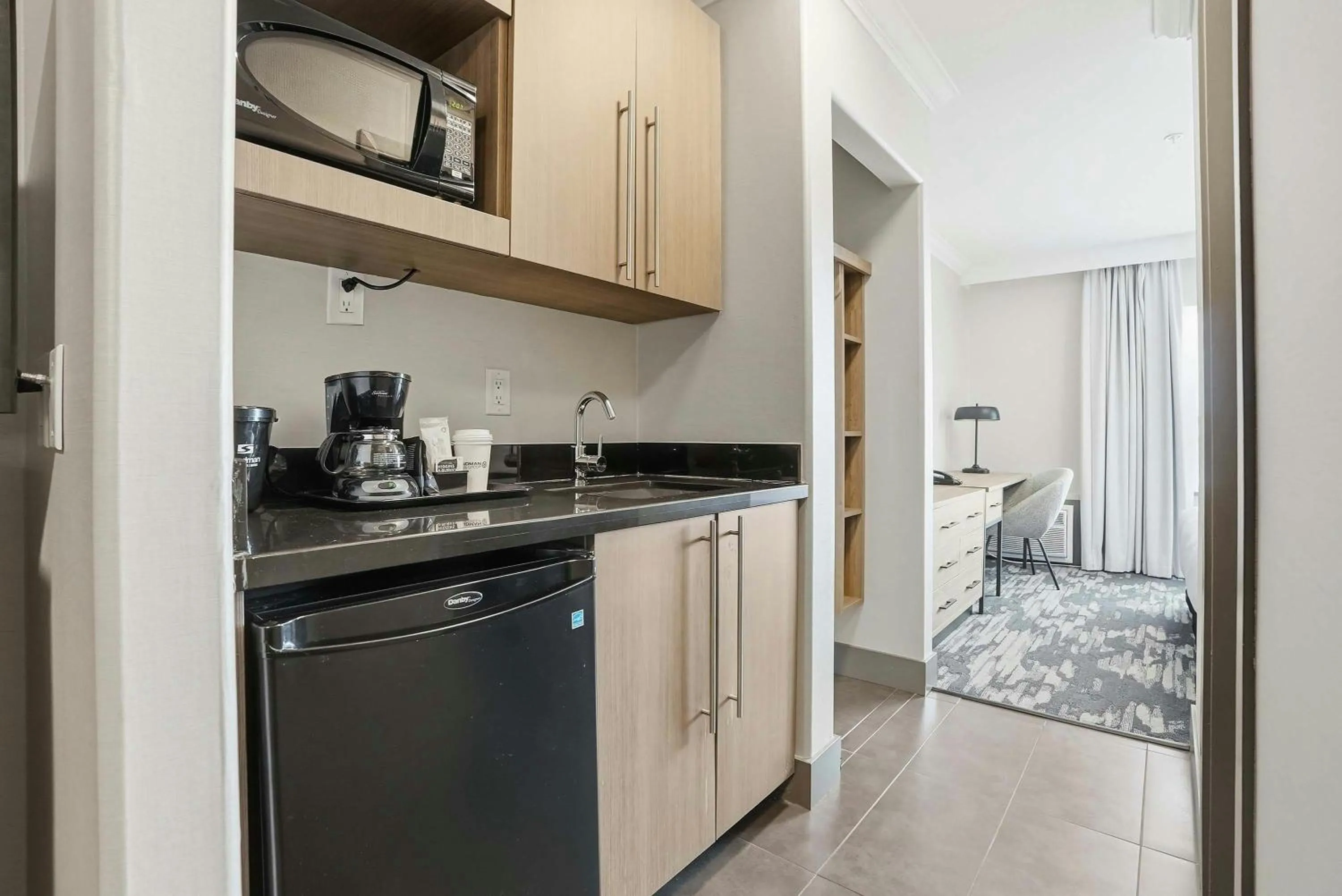 Kitchen or kitchenette in Sandman Hotel Saskatoon