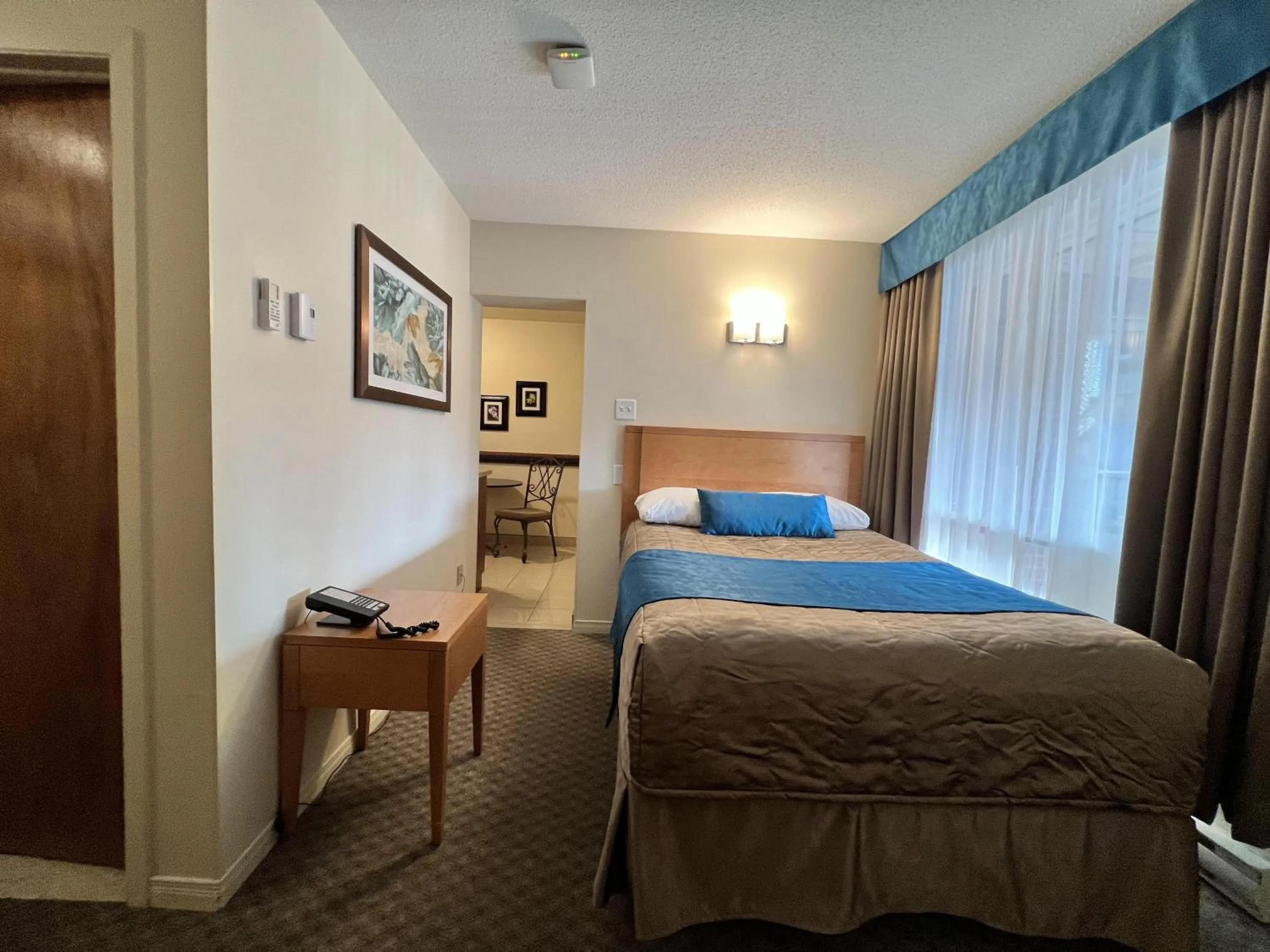 Bed in Motel Du Chevalier