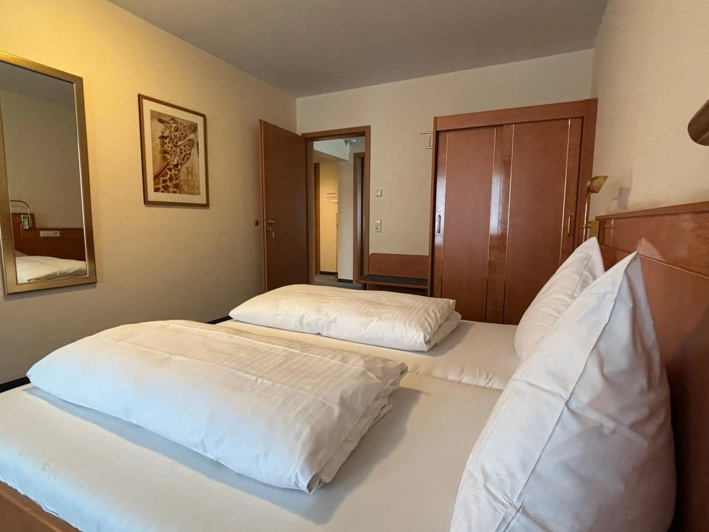 Photo of the whole room, Bed in Hotel Krone Neuenburg