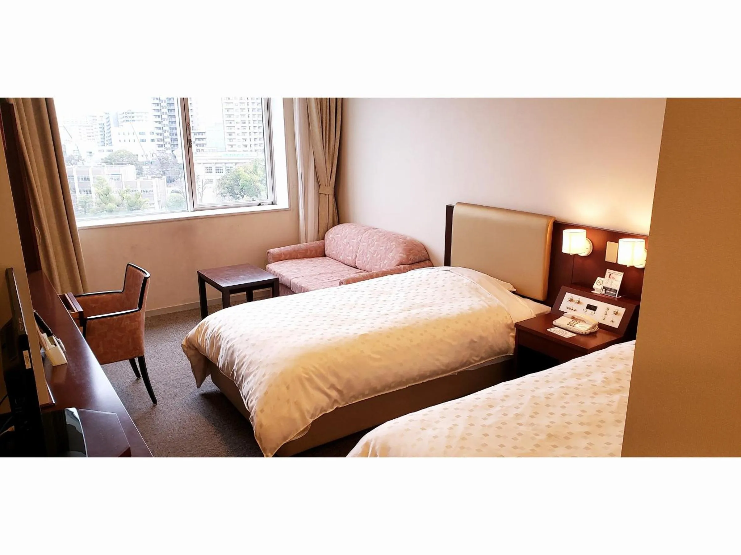 Bed in Hotel Mielparque Kumamoto