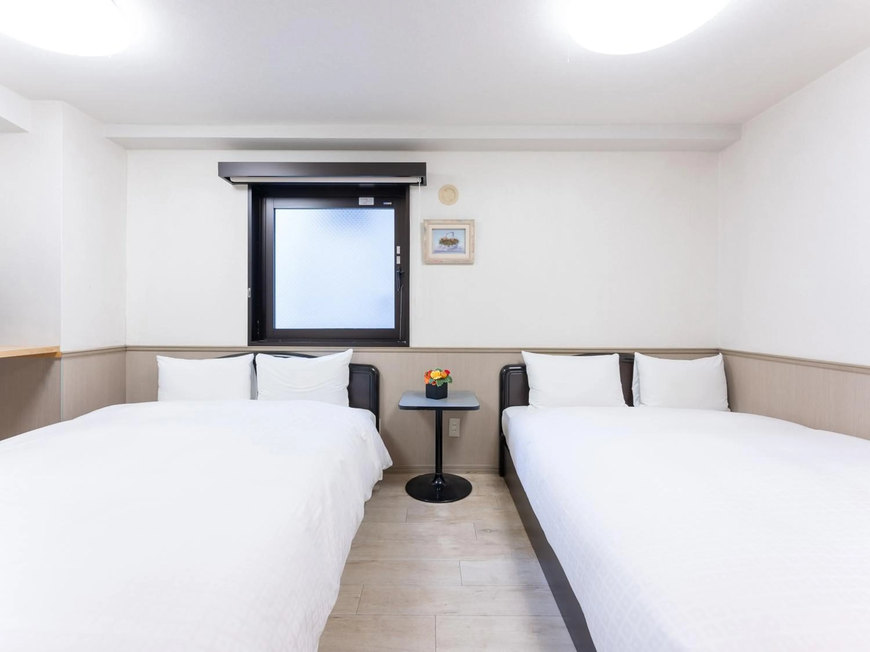 Bed in Chang Tee Hotel Ikebukuro