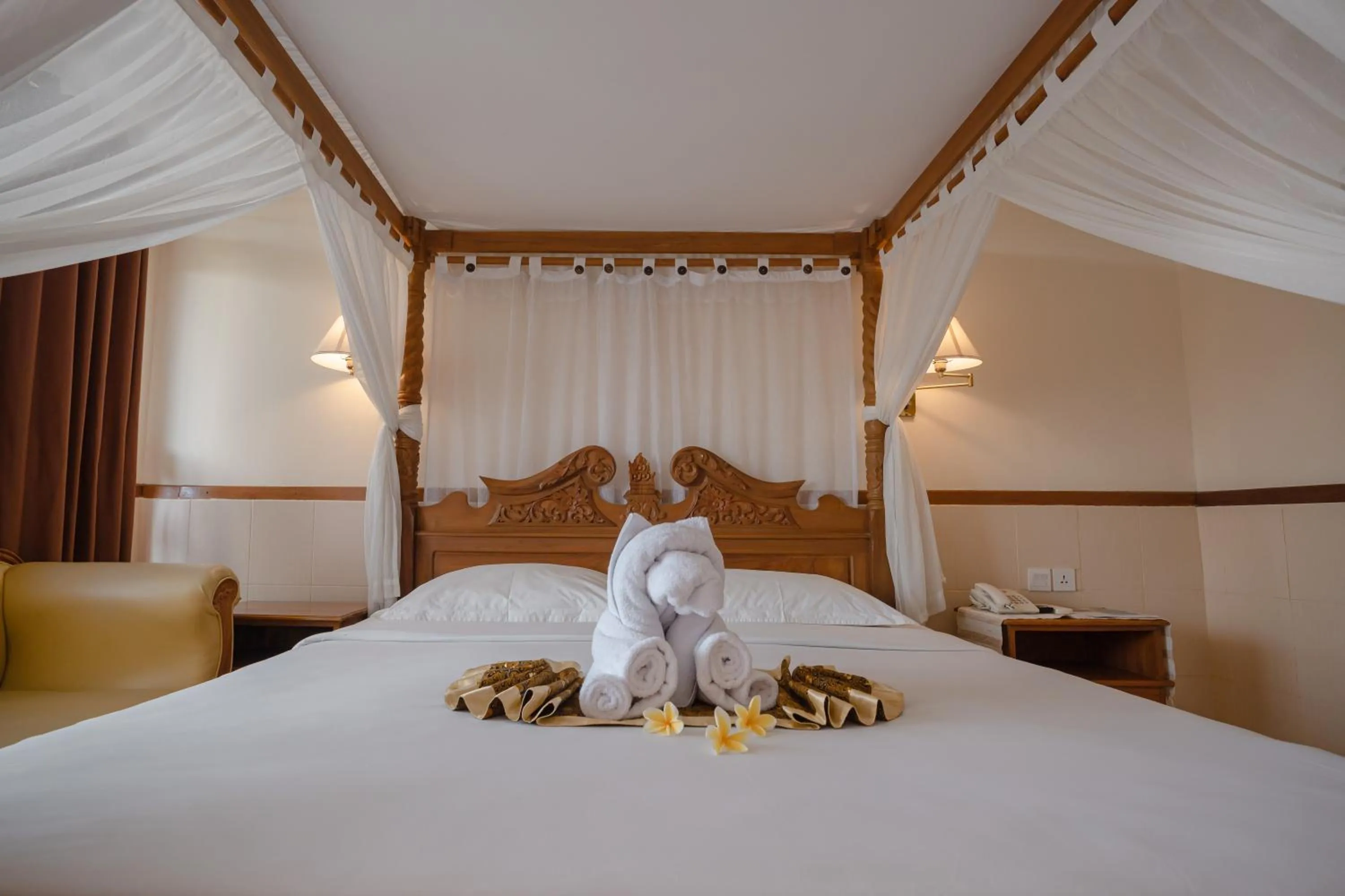 Bed in Palm Beach Hotel Bali