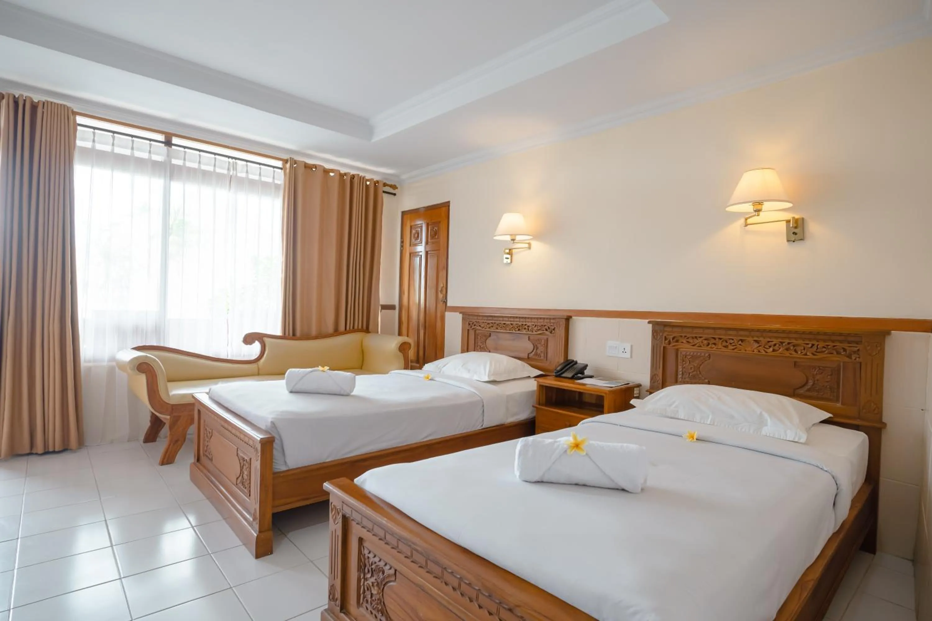 Bed in Palm Beach Hotel Bali