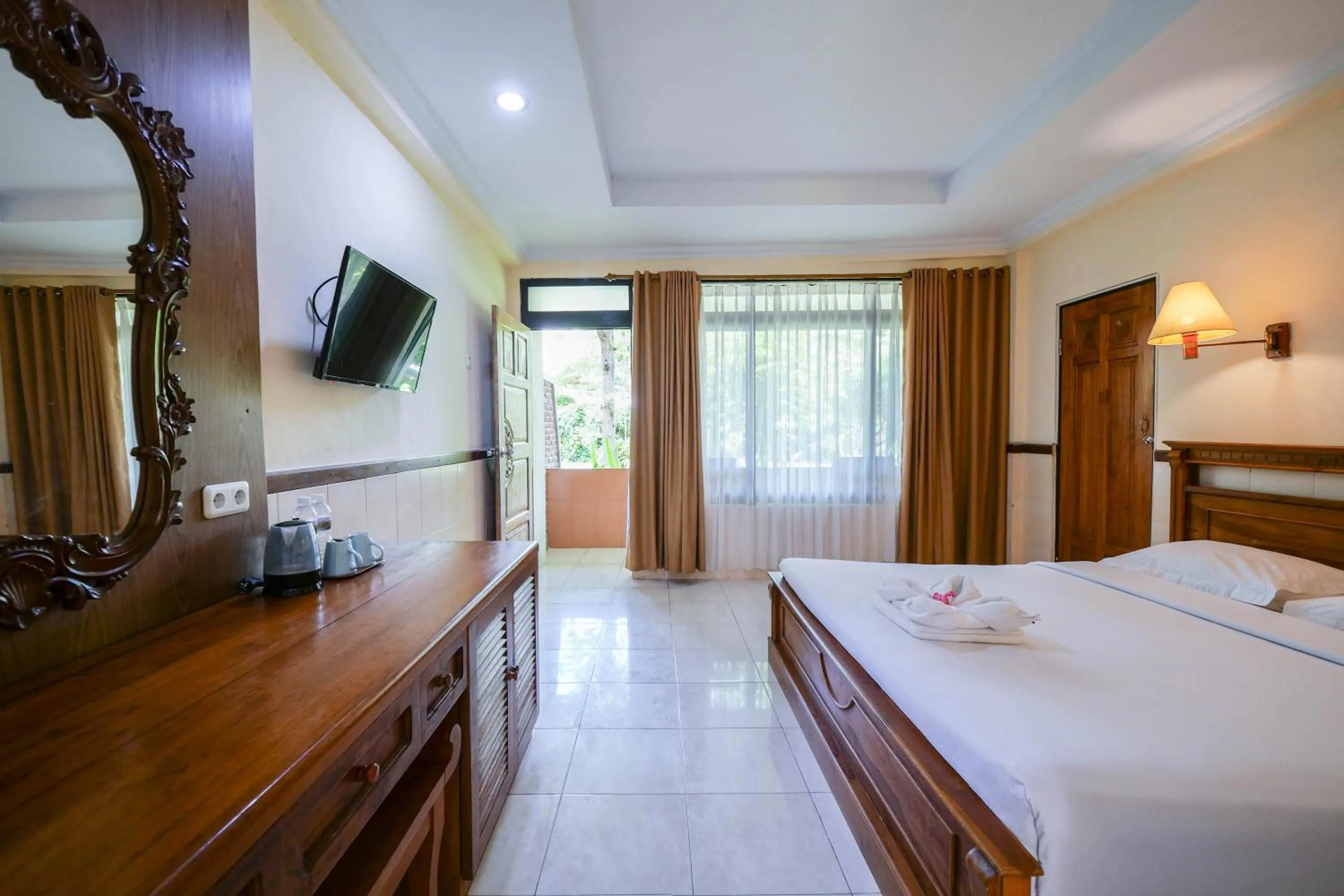 Bed in Palm Beach Hotel Bali