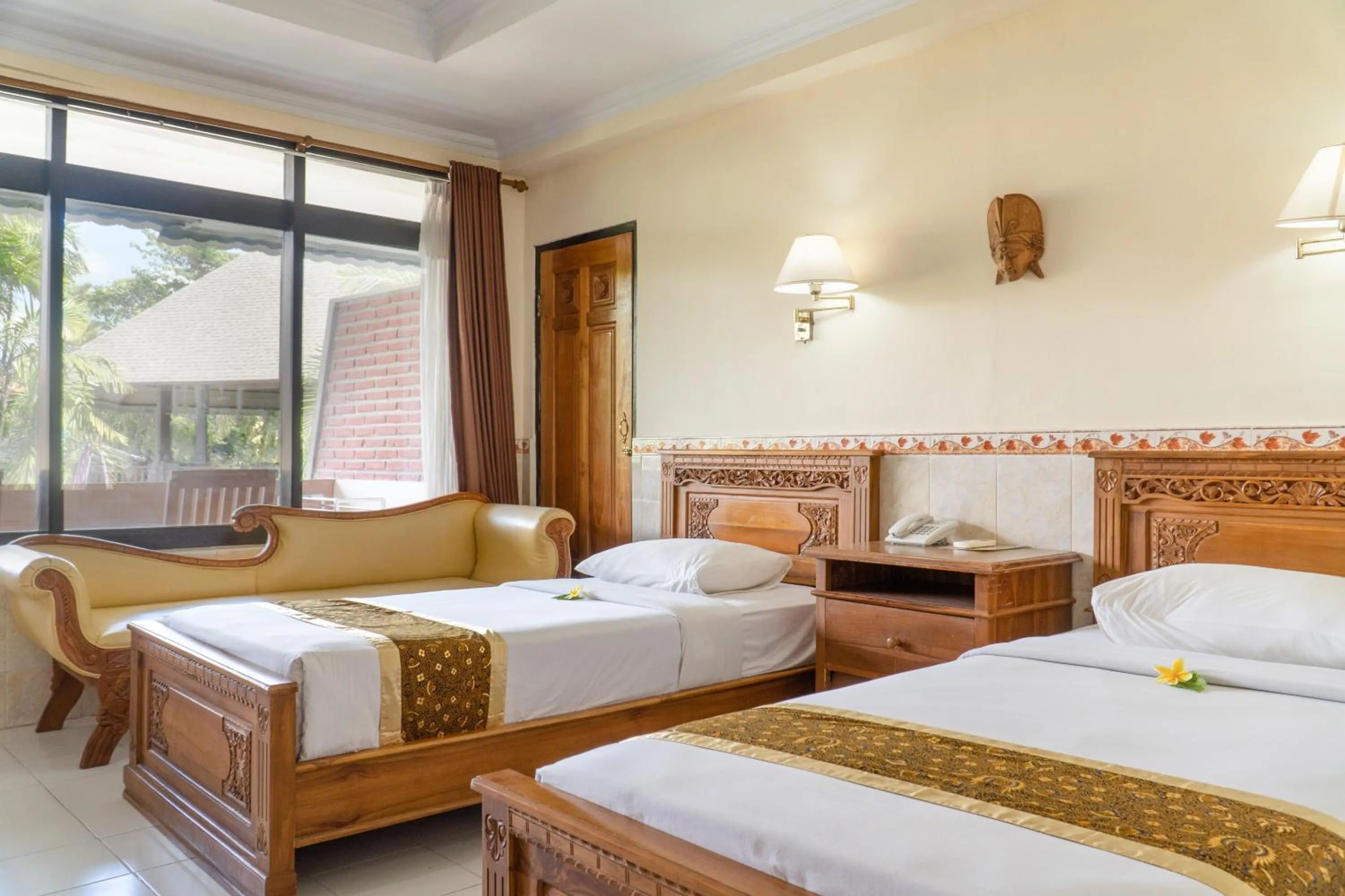 Bed in Palm Beach Hotel Bali