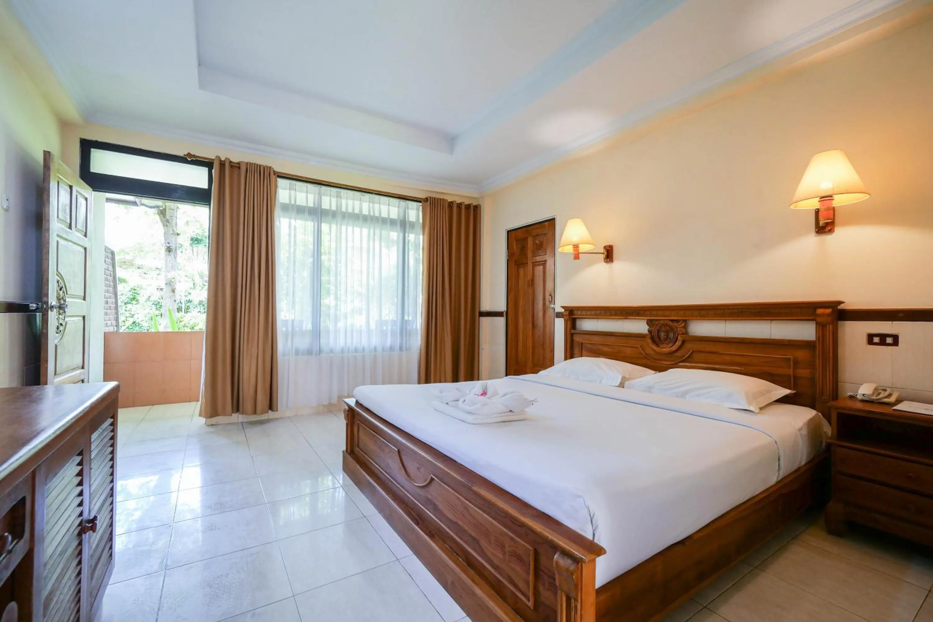 Bed in Palm Beach Hotel Bali