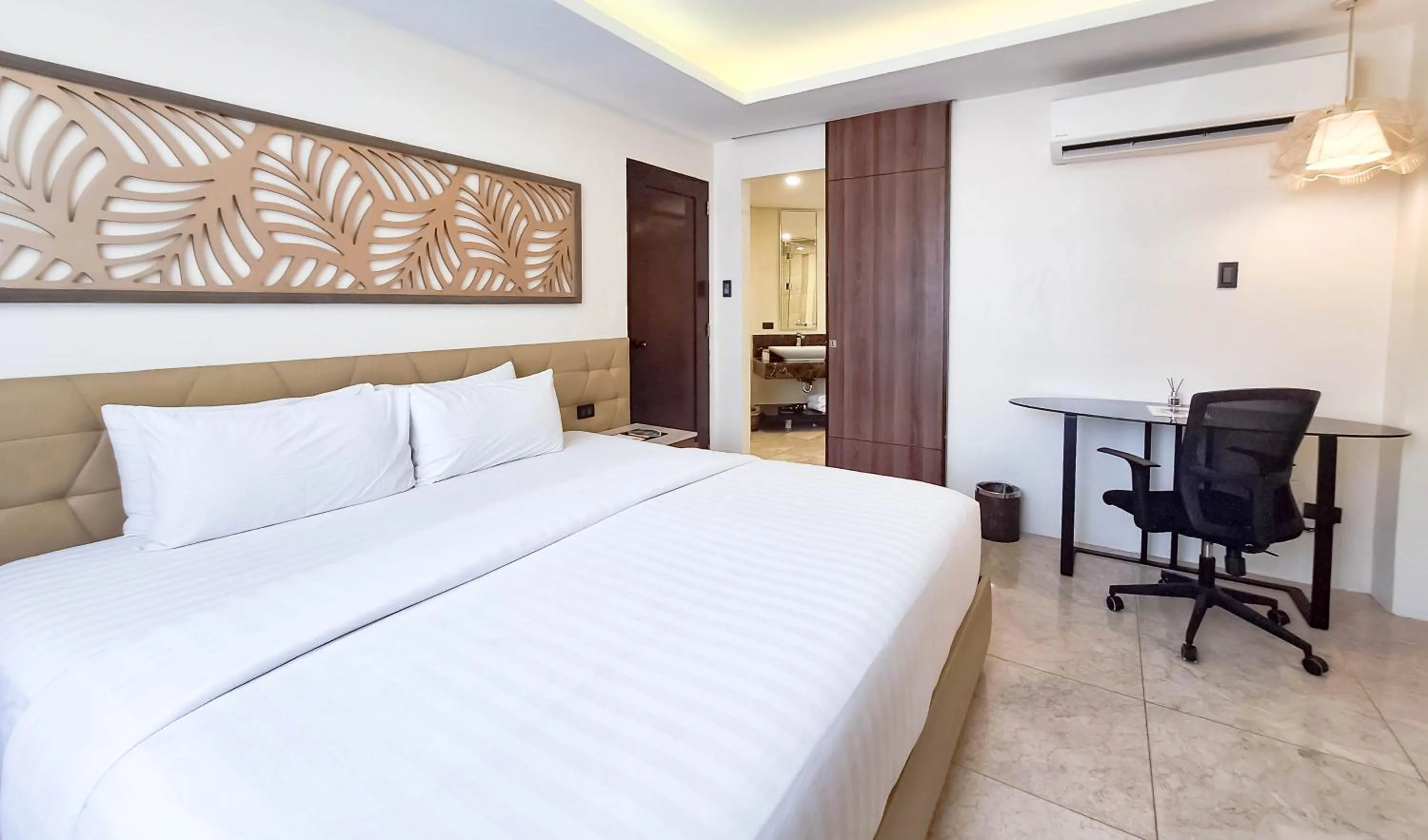 Bed in Boracay Ocean Club Beach Resort