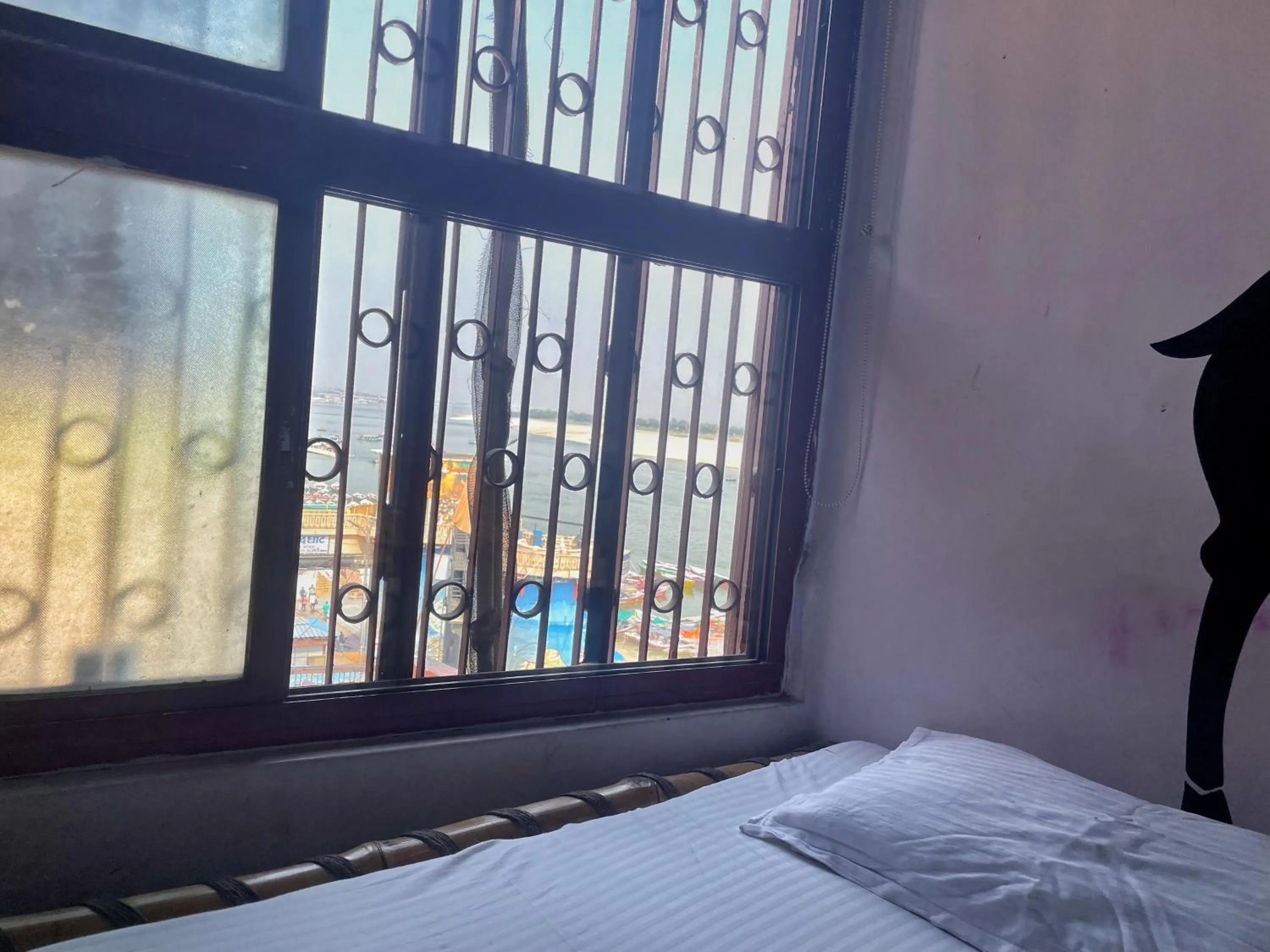 River view, Bed in Shri Guest House