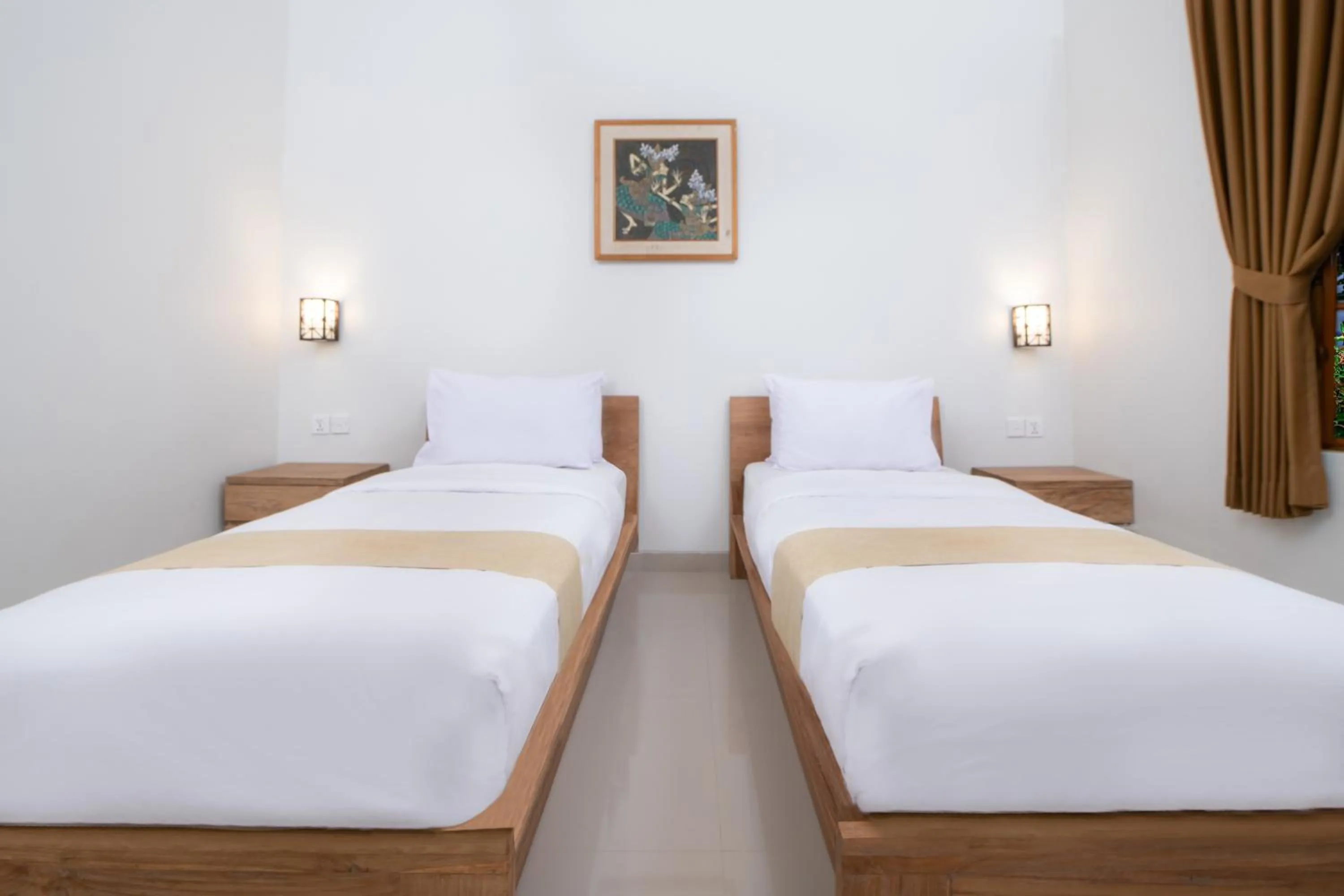 Bed in Villa Bunga Hotel