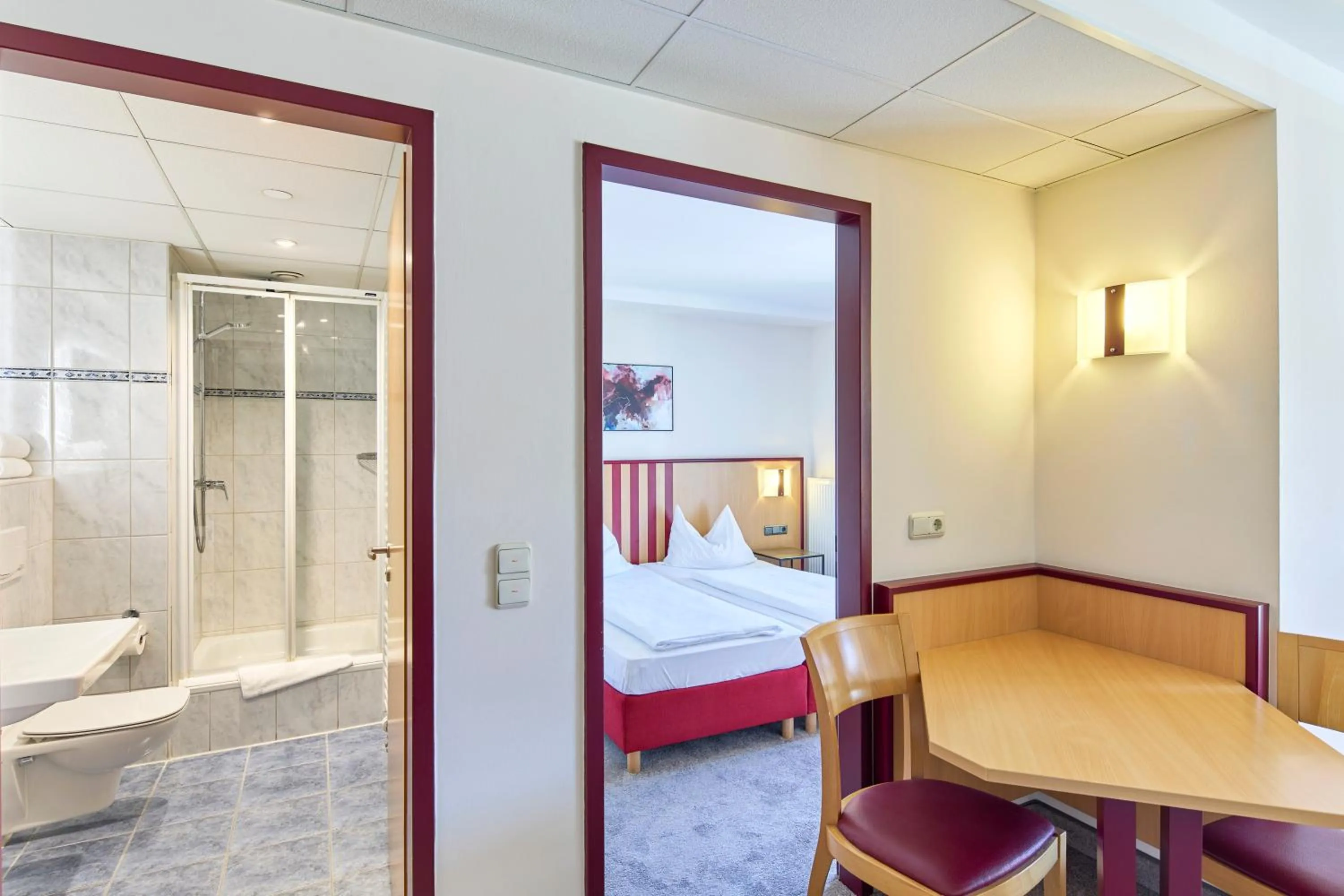 Bathroom, Bed in Apartments Aschheim