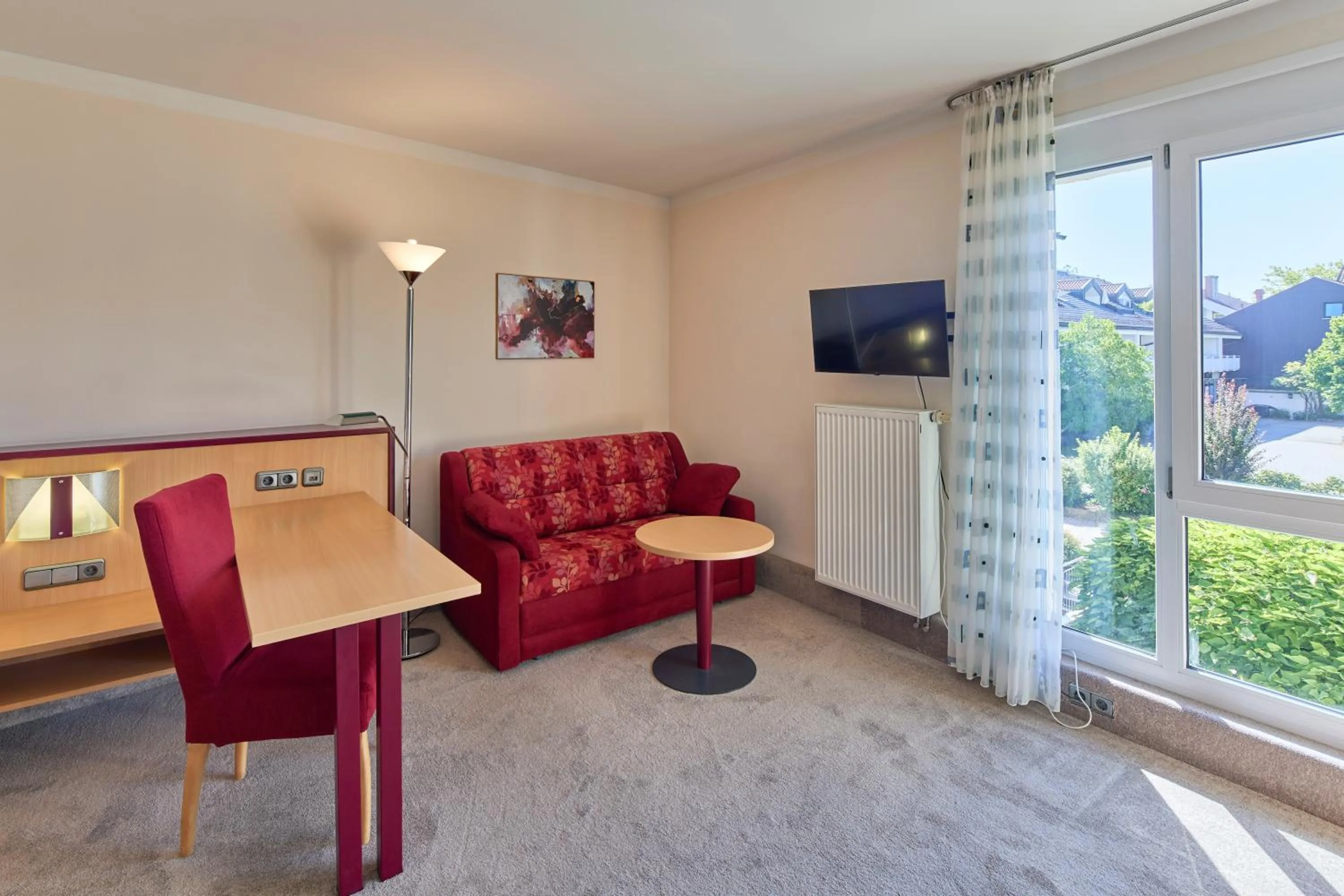 Communal lounge/ TV room in Apartments Aschheim