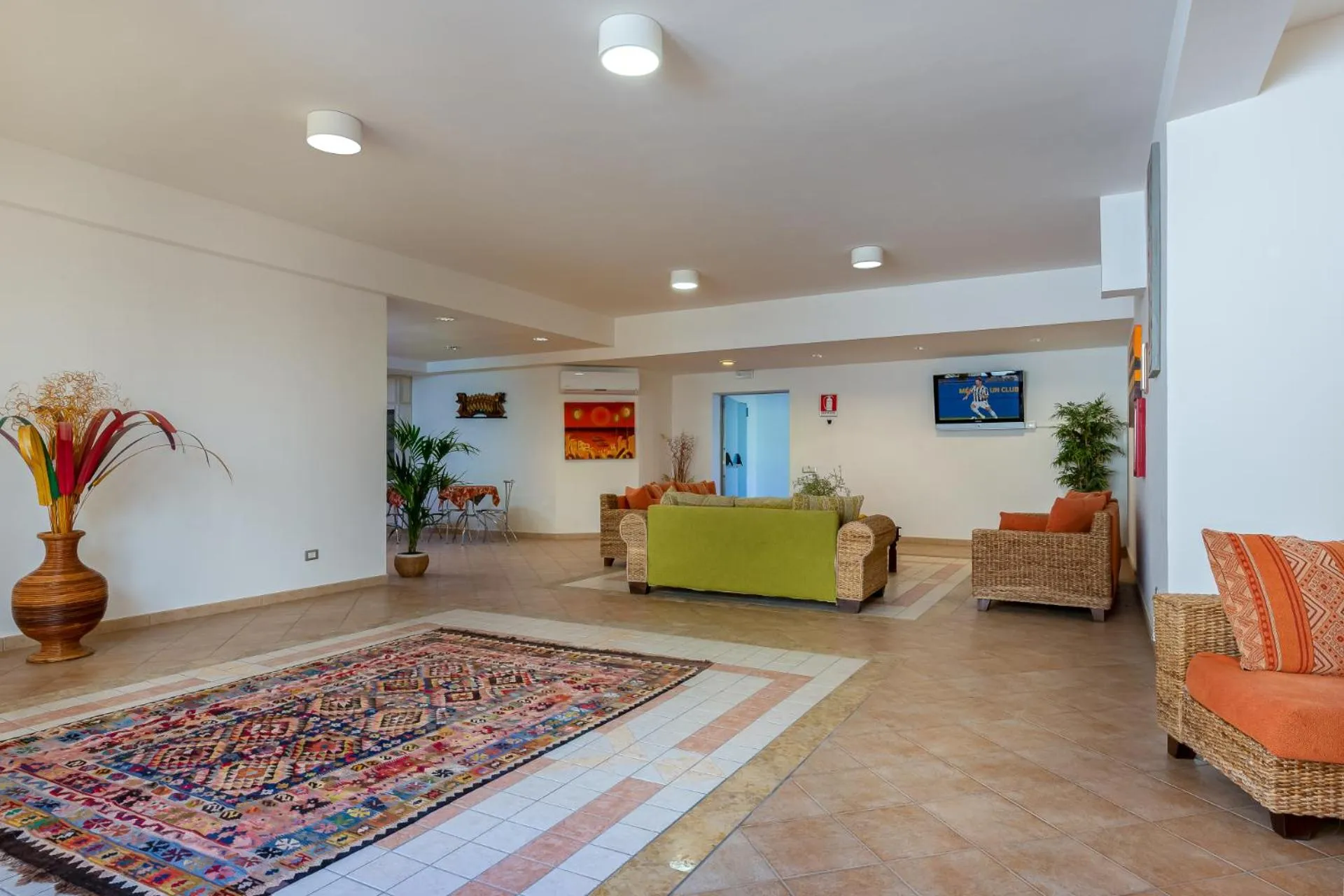 Communal lounge/ TV room in Helios Hotel