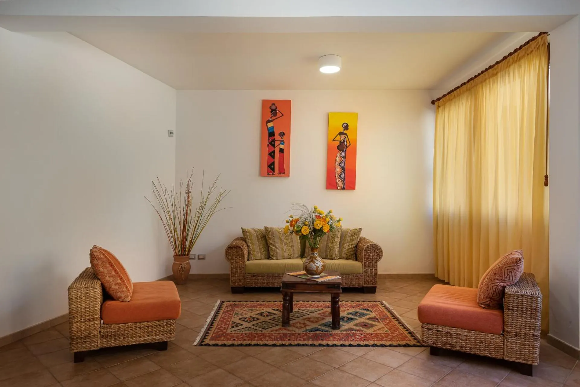 Communal lounge/ TV room in Helios Hotel