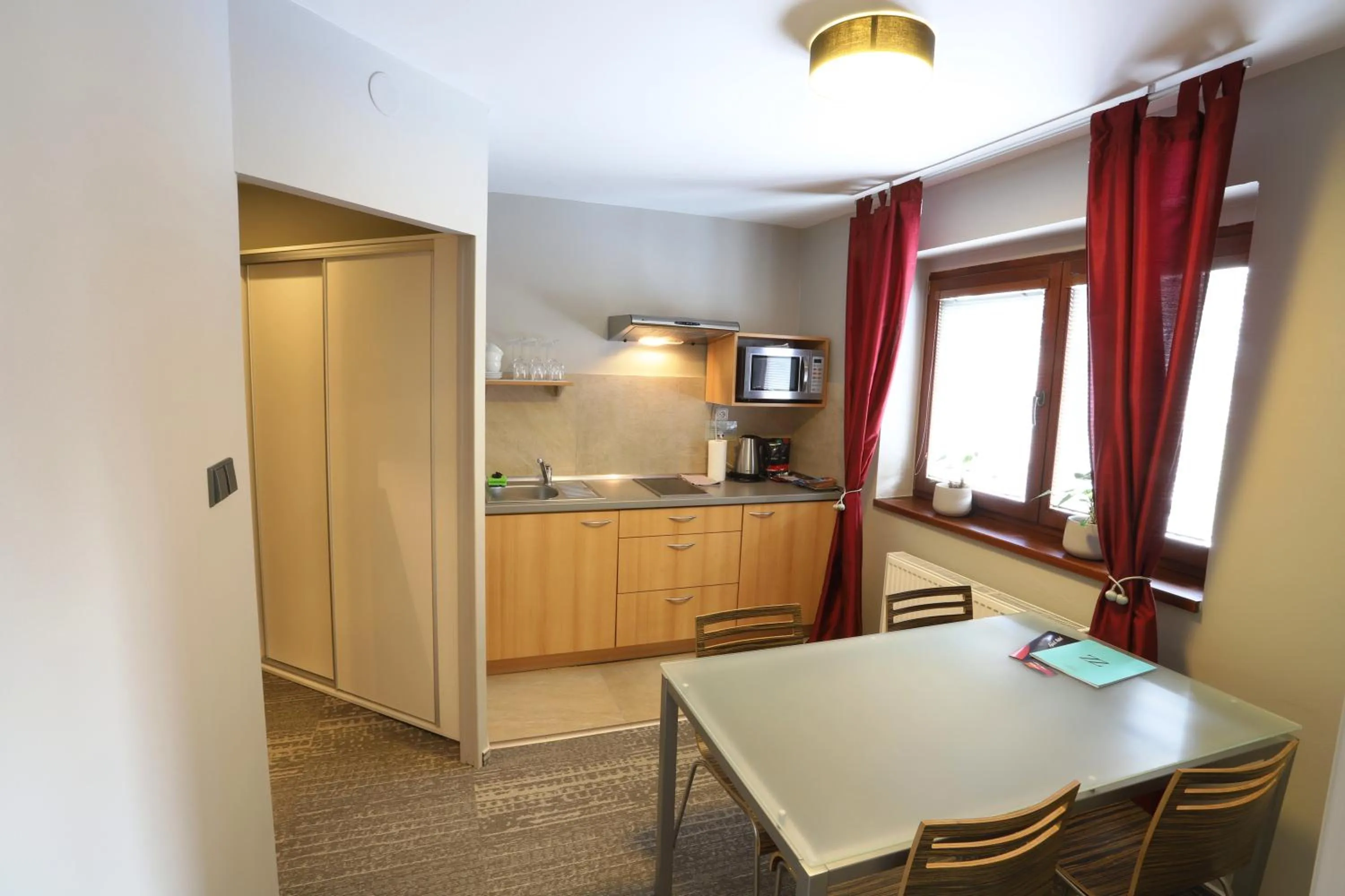 Kitchen or kitchenette in Apart Hotel Jablonec