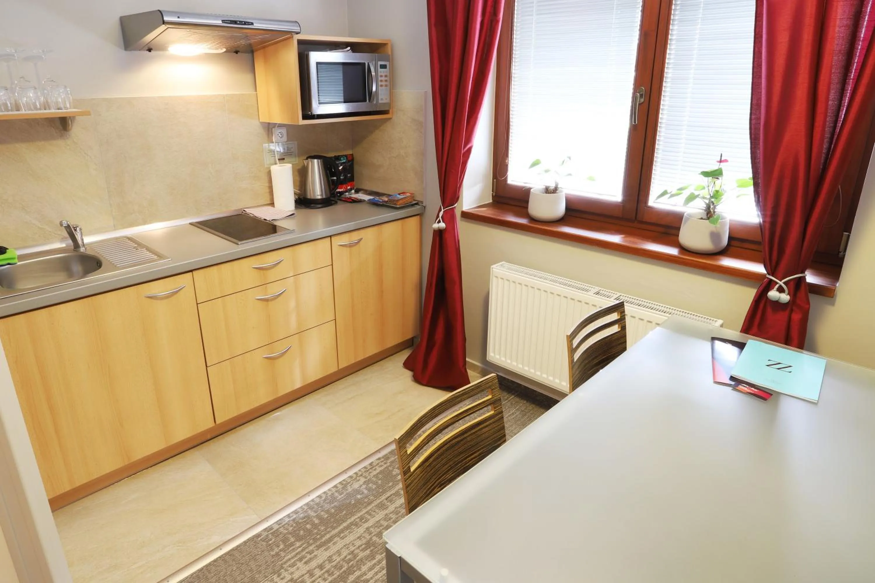 Kitchen or kitchenette in Apart Hotel Jablonec
