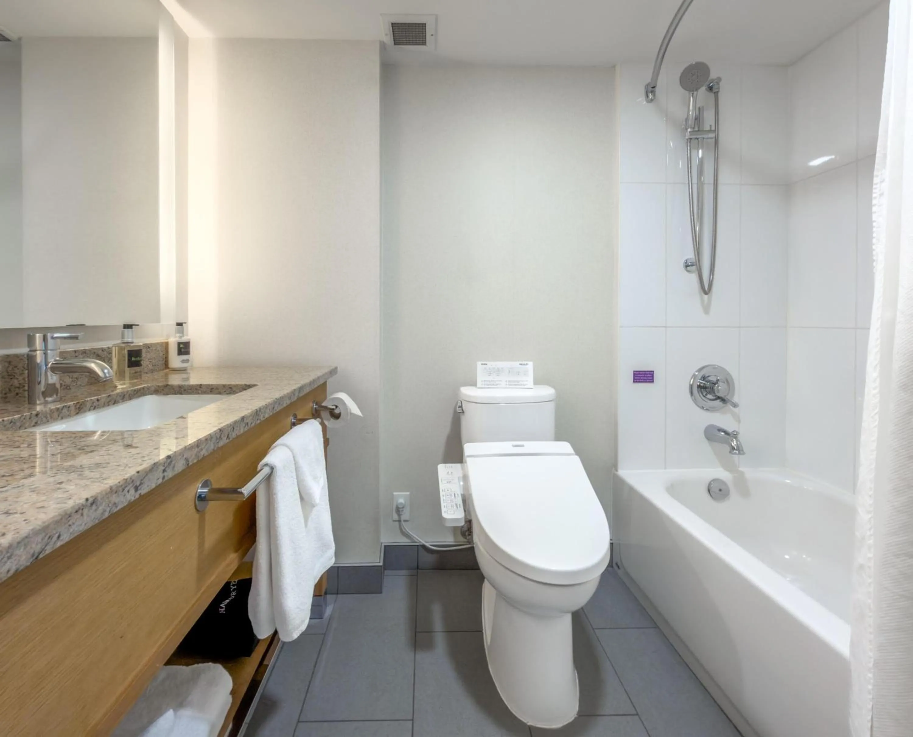 Bathroom in Coast Chilliwack Hotel by APA