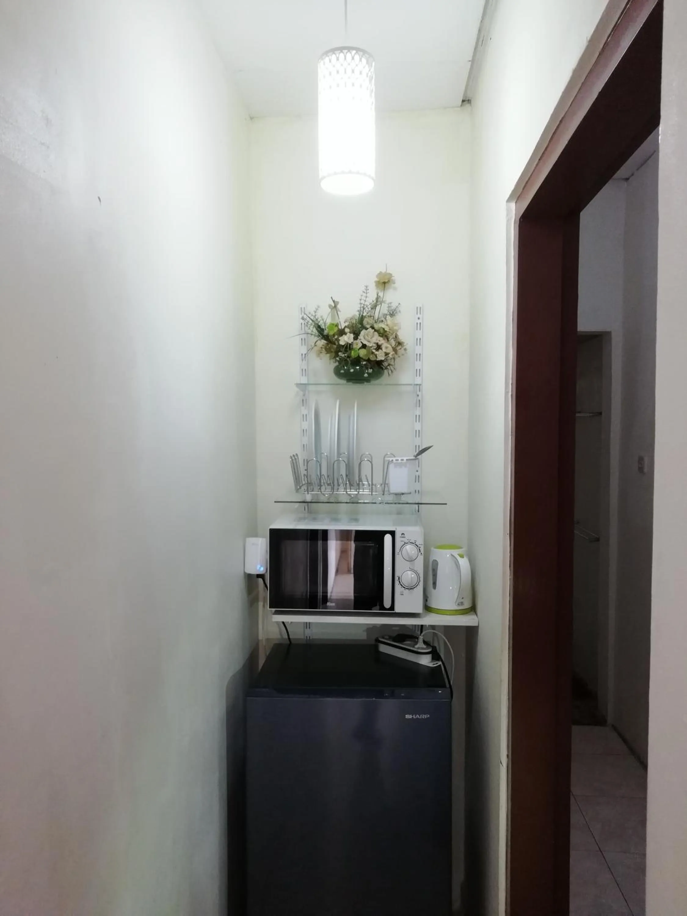 Kitchen or kitchenette in GIO Guesthouse Bogor