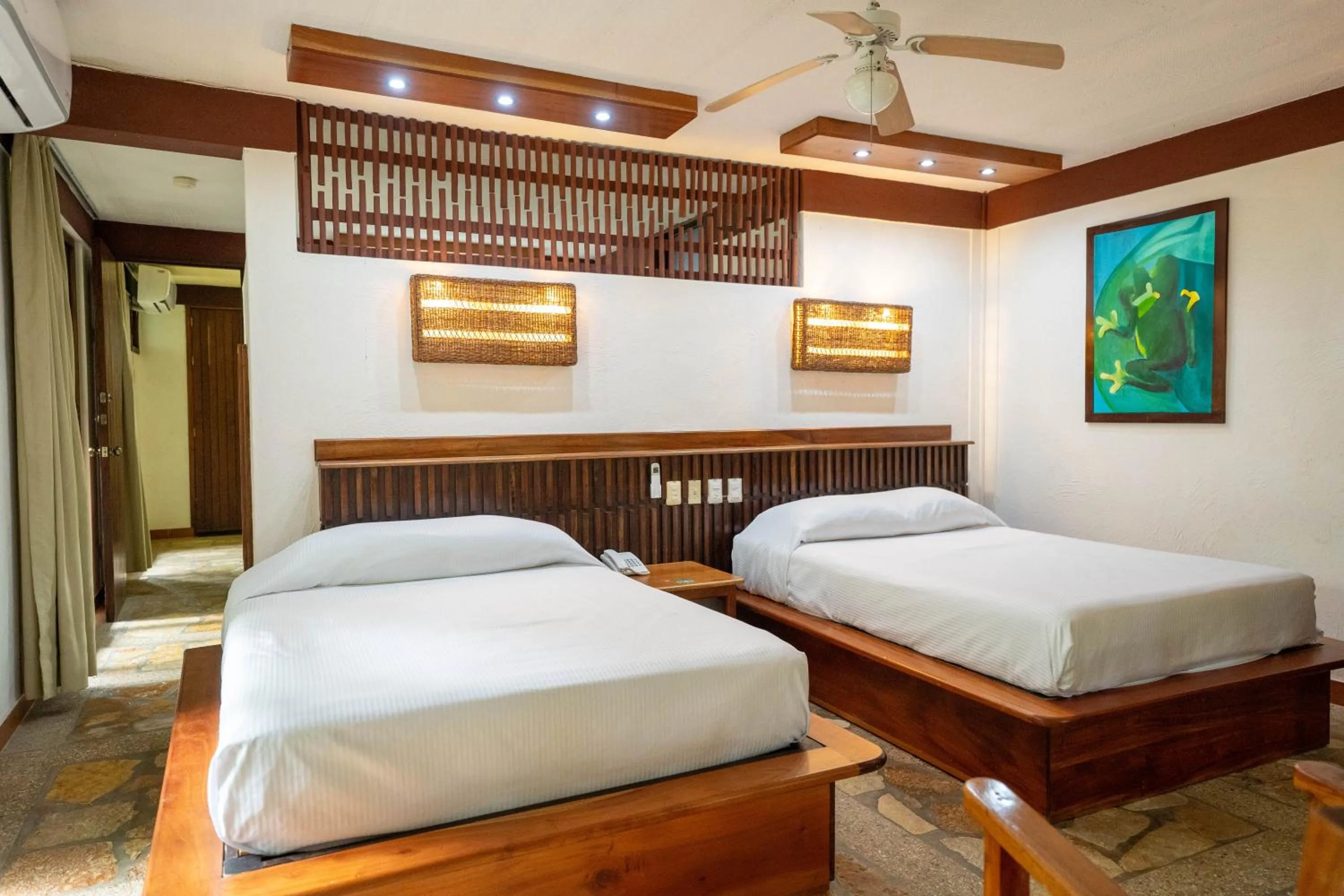 Bed in Chan-Kah Resort Village