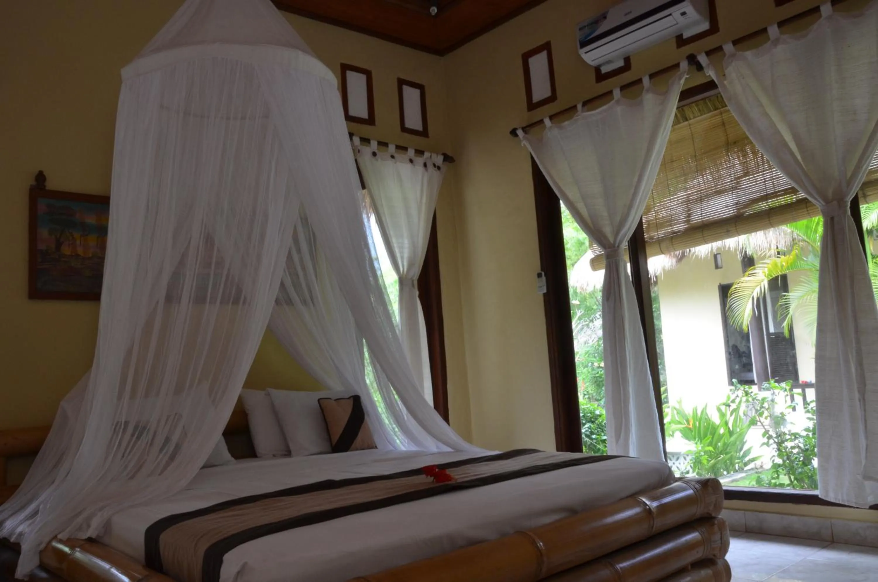 Bed in Tamarind Beach Bungalow