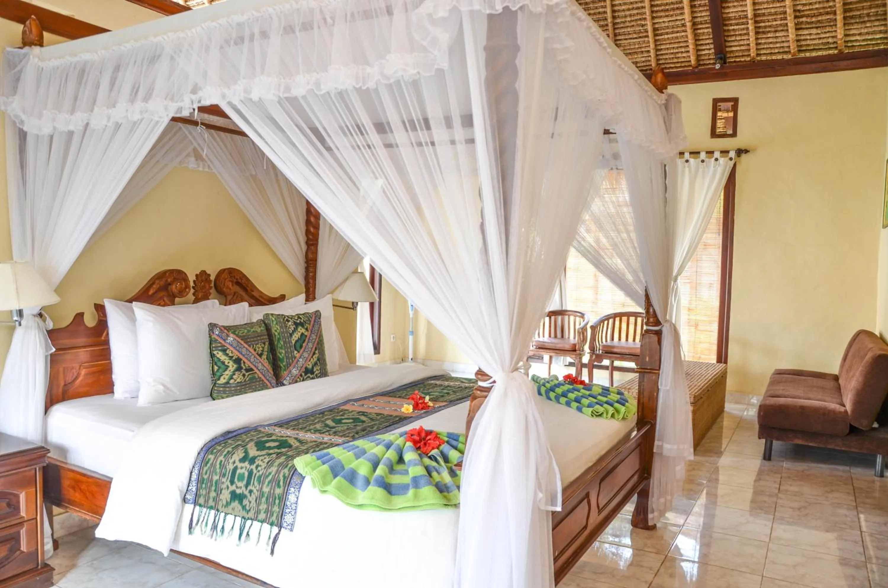 Bed in Tamarind Beach Bungalow