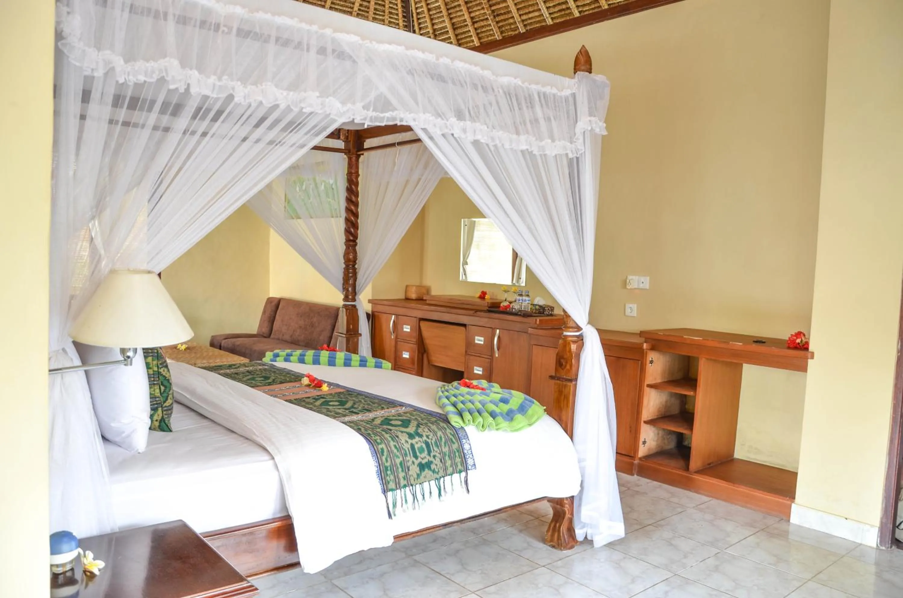 Bed in Tamarind Beach Bungalow