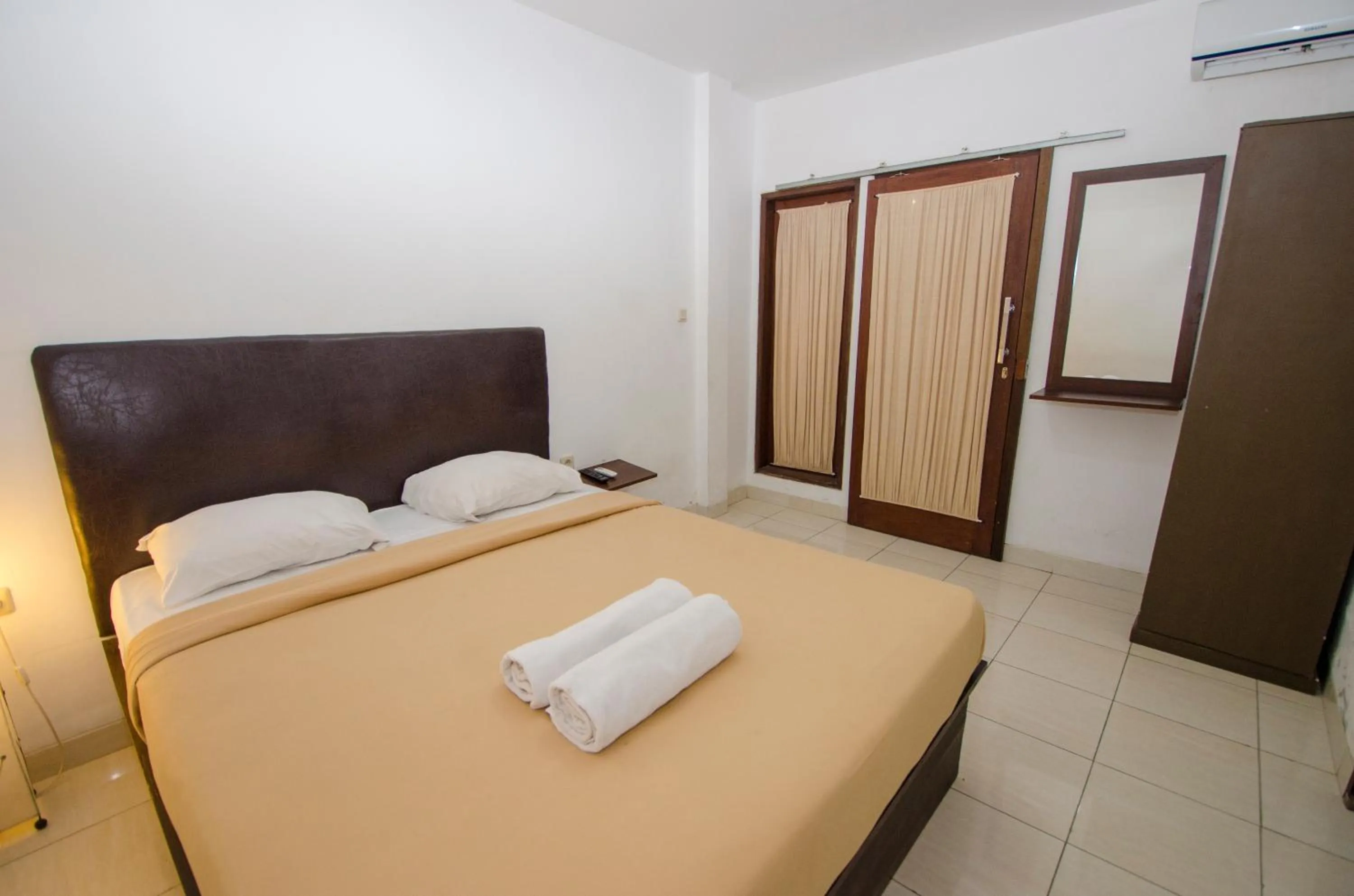 Bedroom, Bed in Taman Sari Cottages