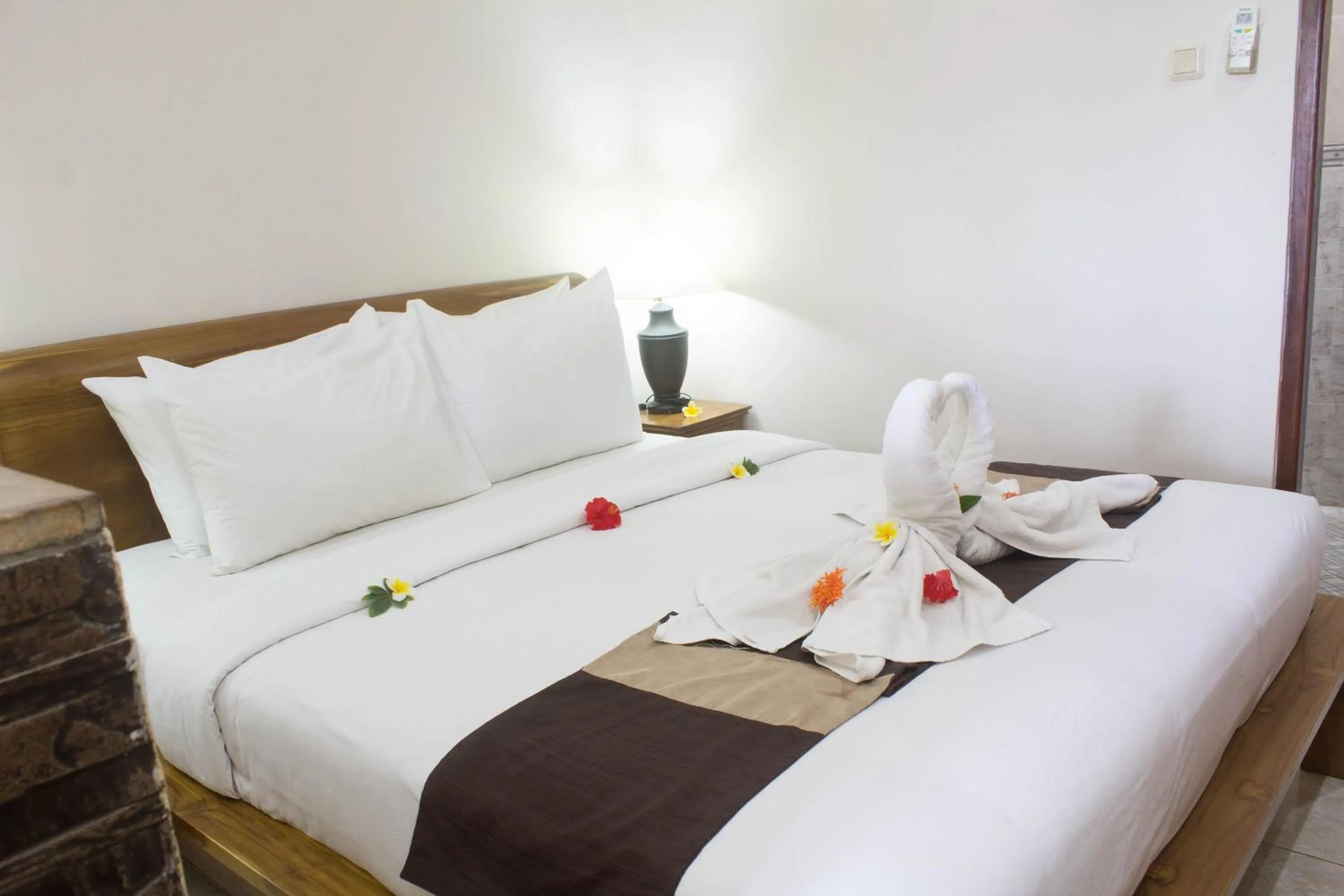 Bed in Bali Palms Resort