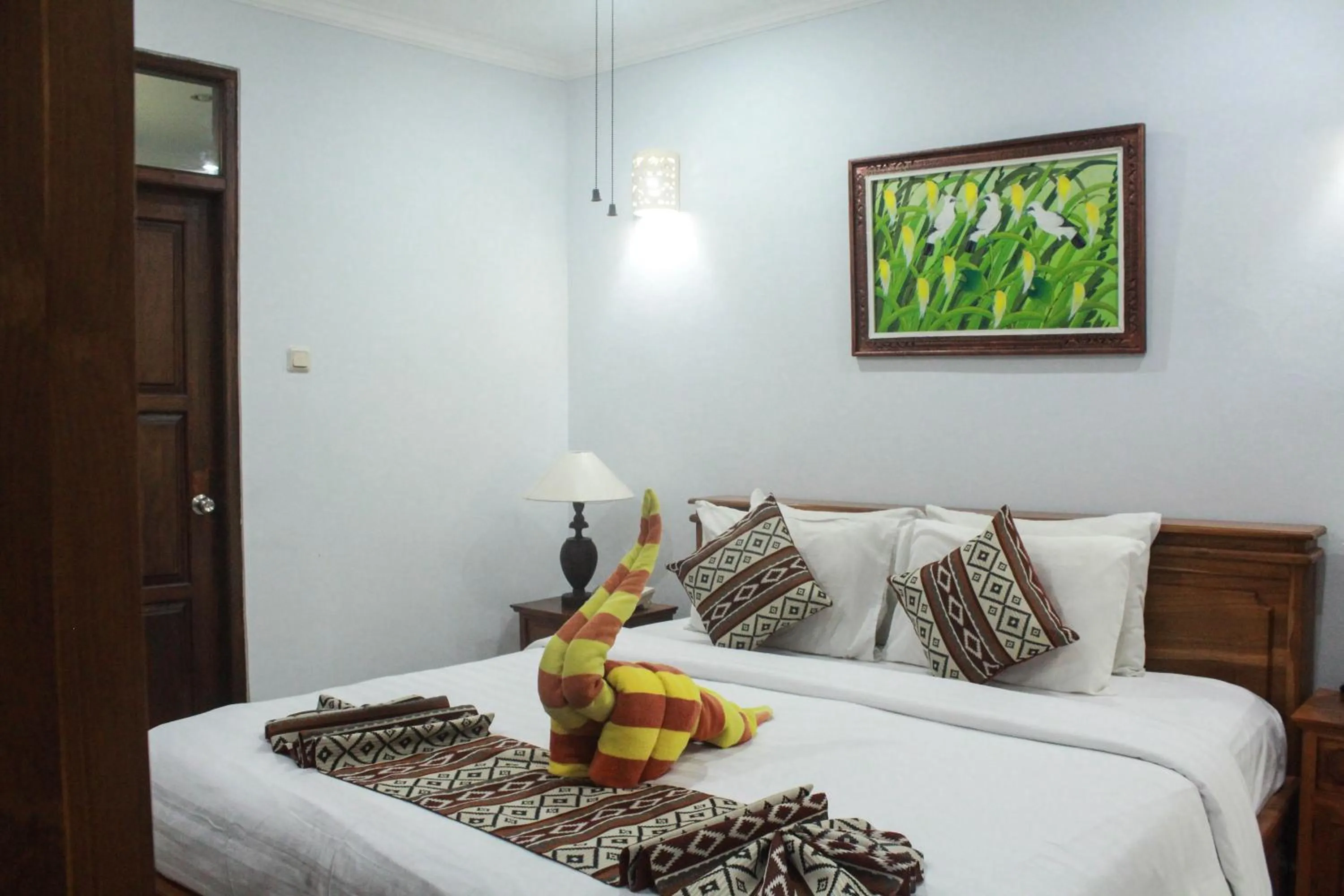 Bed in Bali Palms Resort