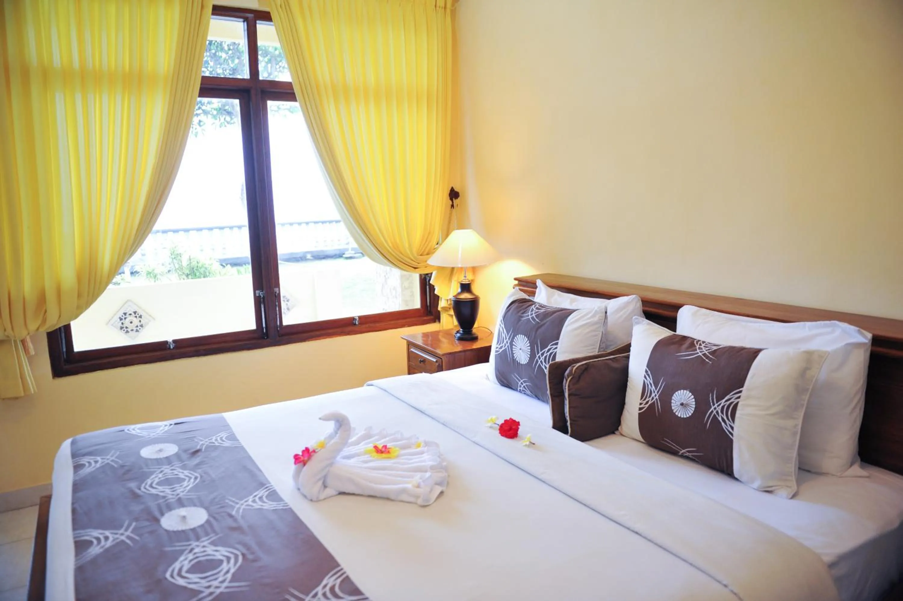 Bed in Bali Palms Resort