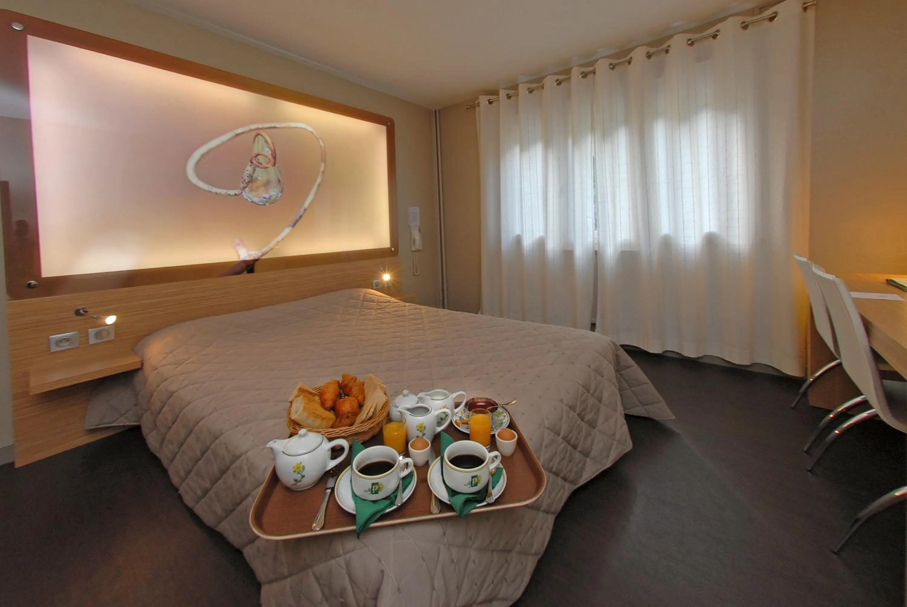 Bed in Logis Hotel Restaurant des Gorges du Tarn