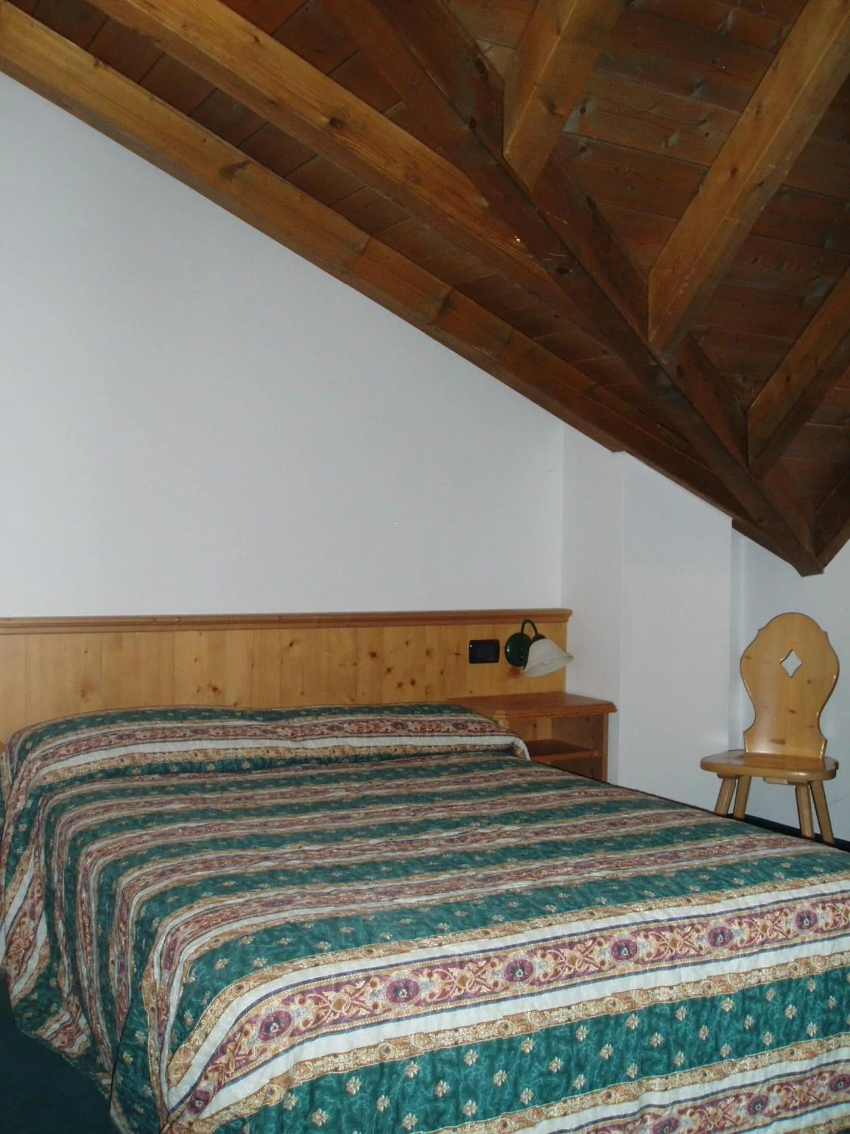 Decorative detail, Bed in Giongo Residence - Appartamenti