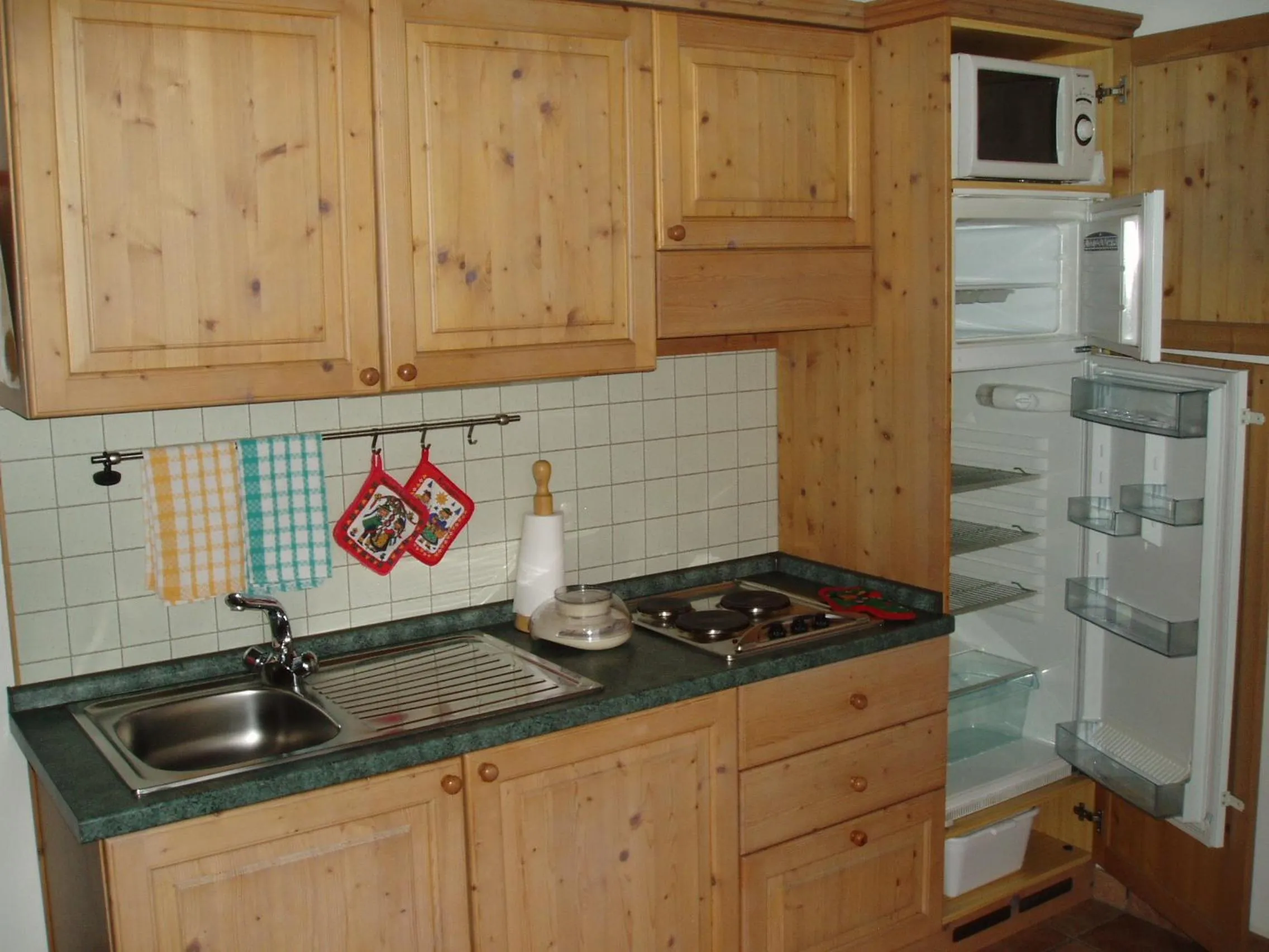 Kitchen or kitchenette in Giongo Residence - Appartamenti