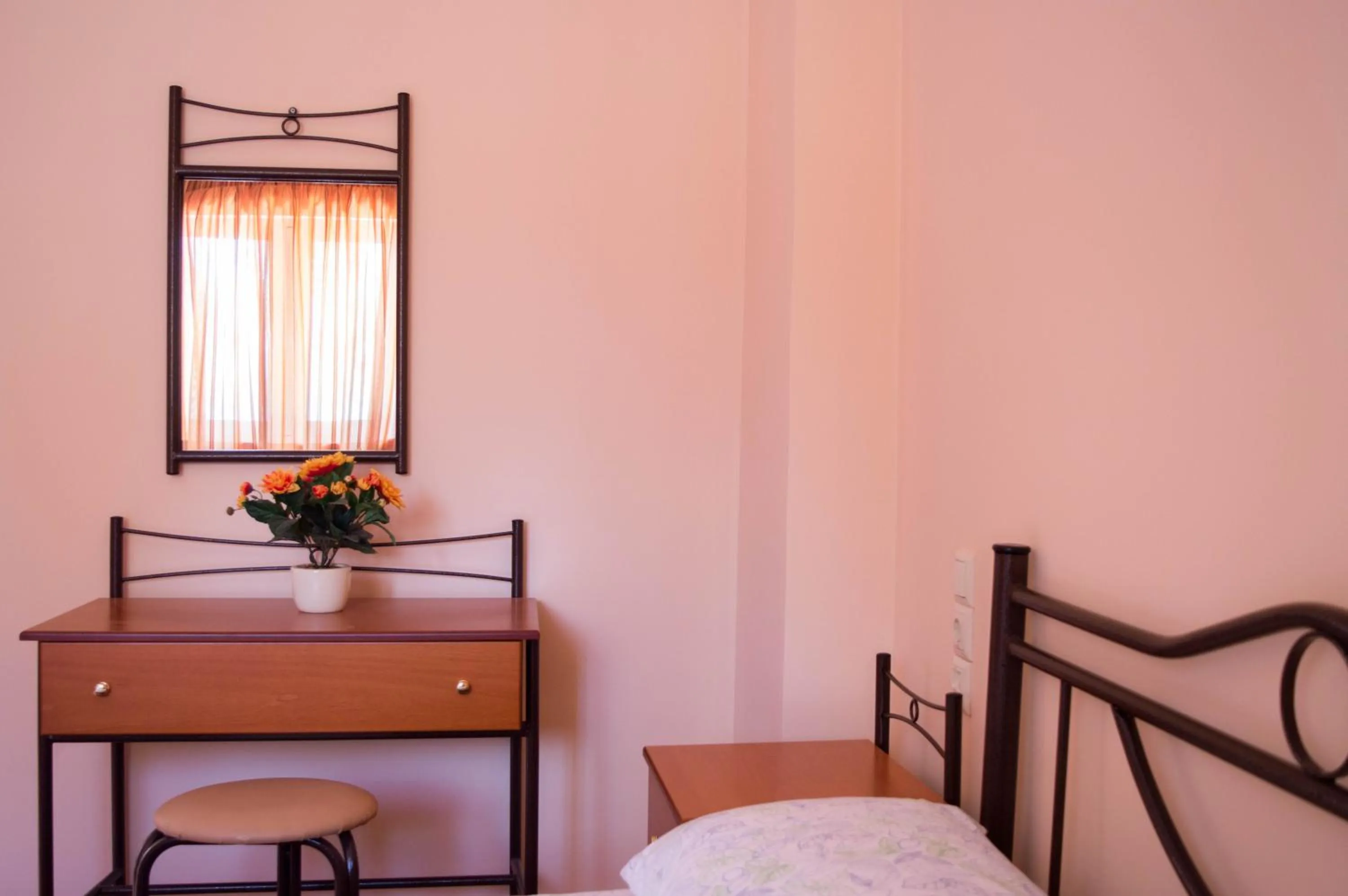 Bed in Manesi Apartments