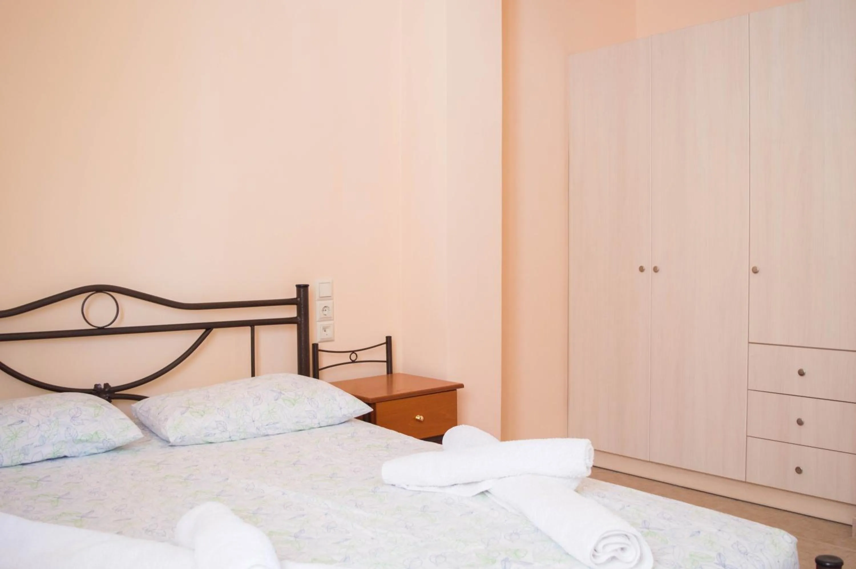 Bed in Manesi Apartments