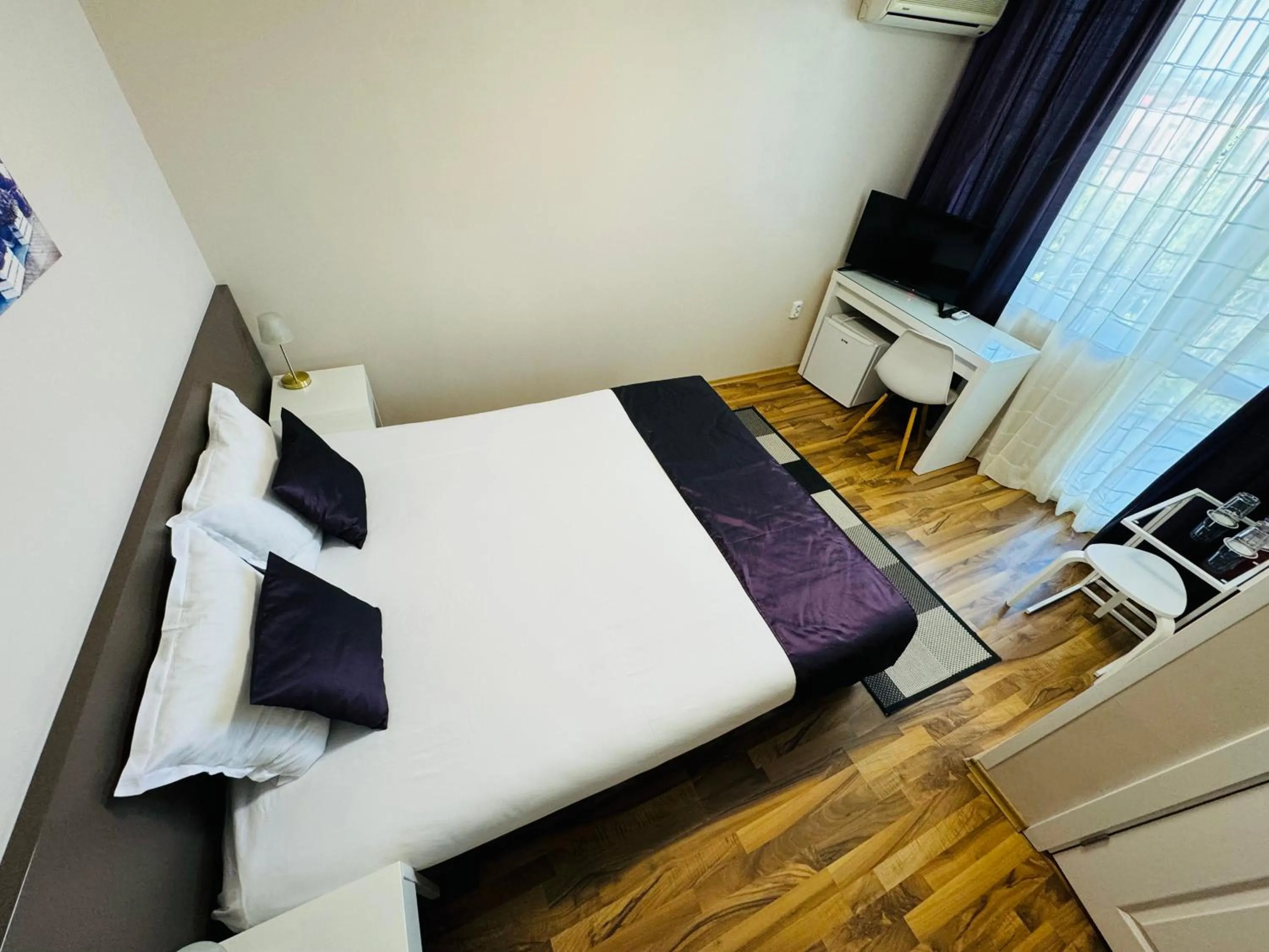 Bed in Hotel Amfora