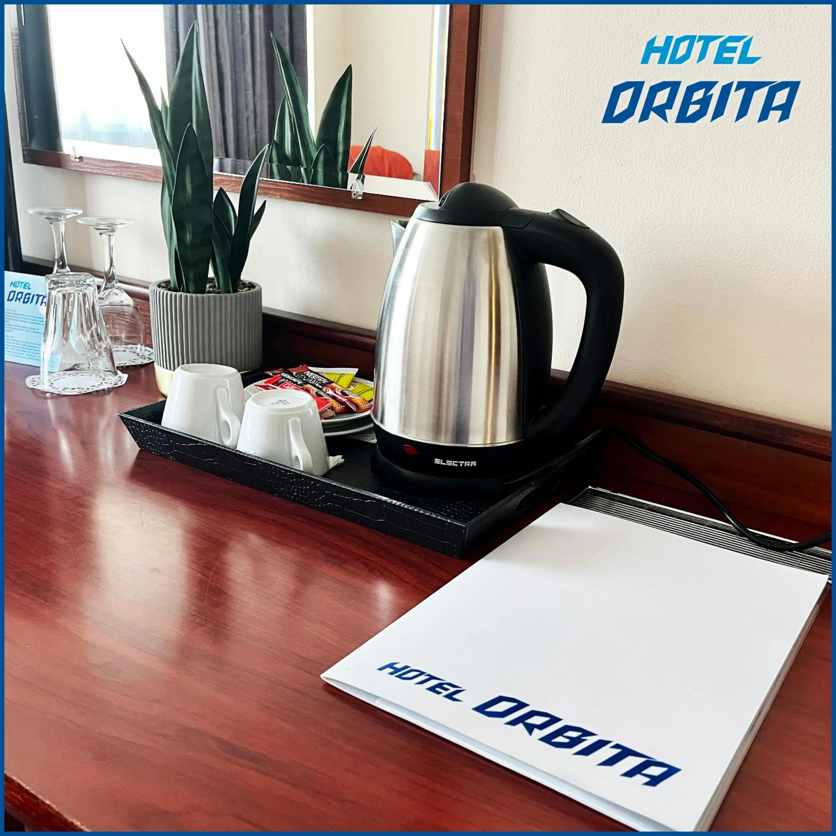 Property logo or sign in Hotel Orbita