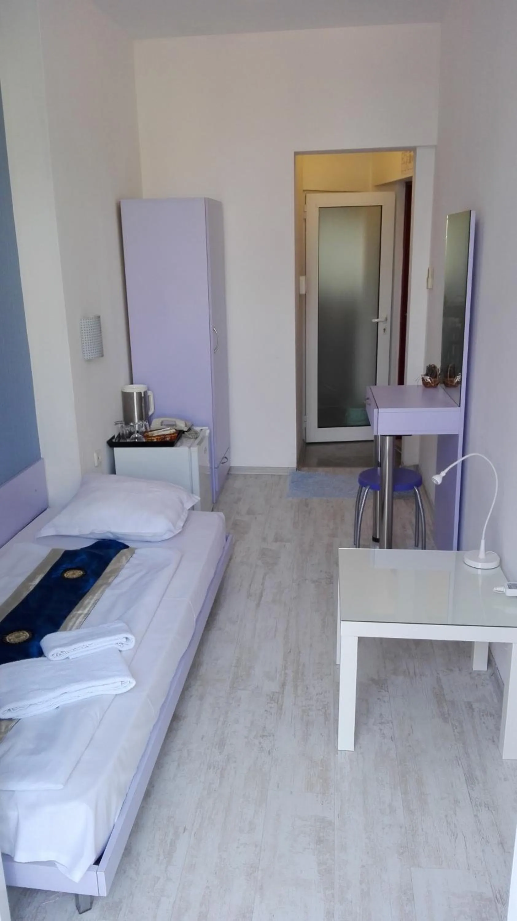 Bed in Scotty's Boutique Hotel