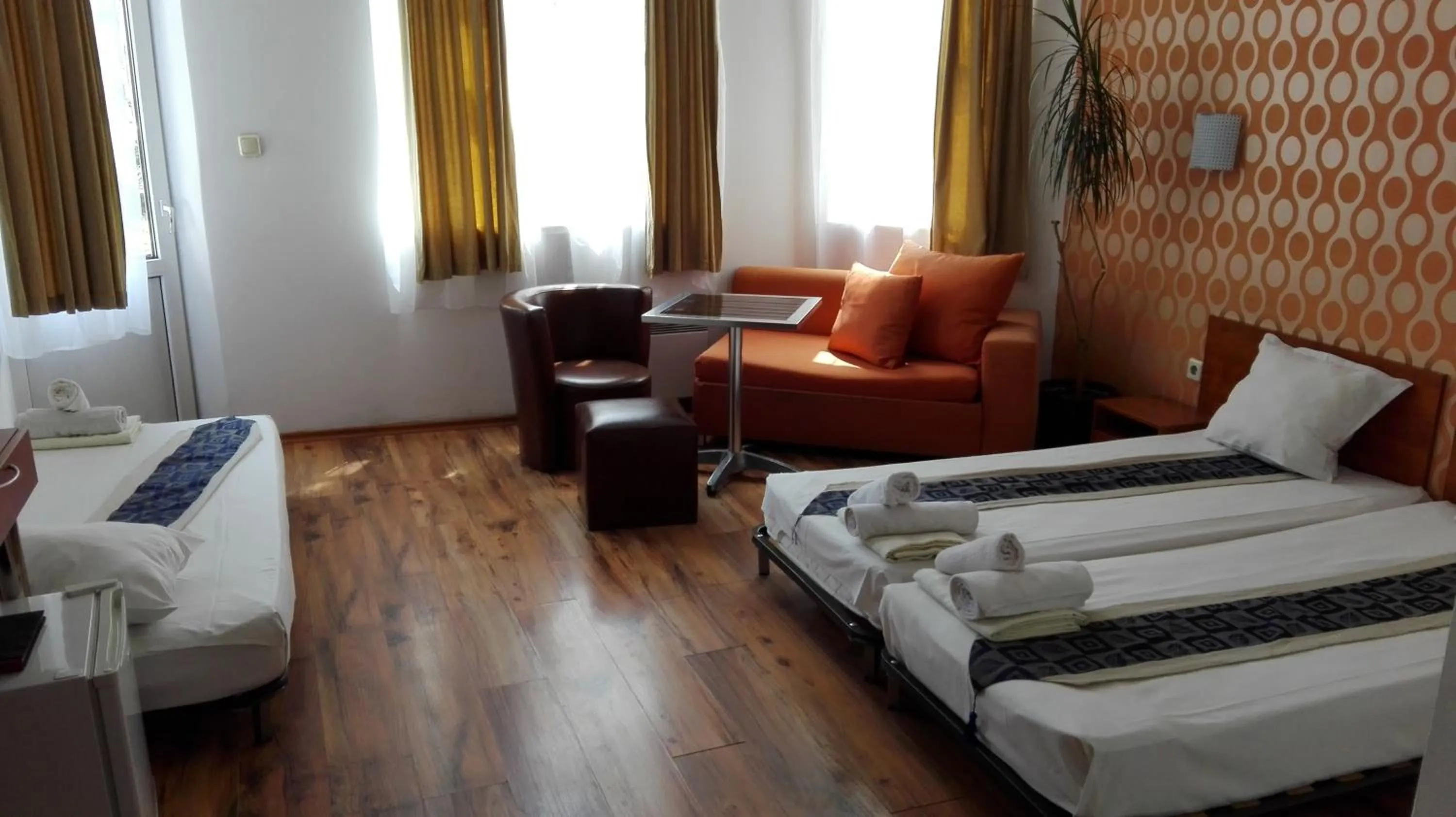 Bed in Scotty's Boutique Hotel