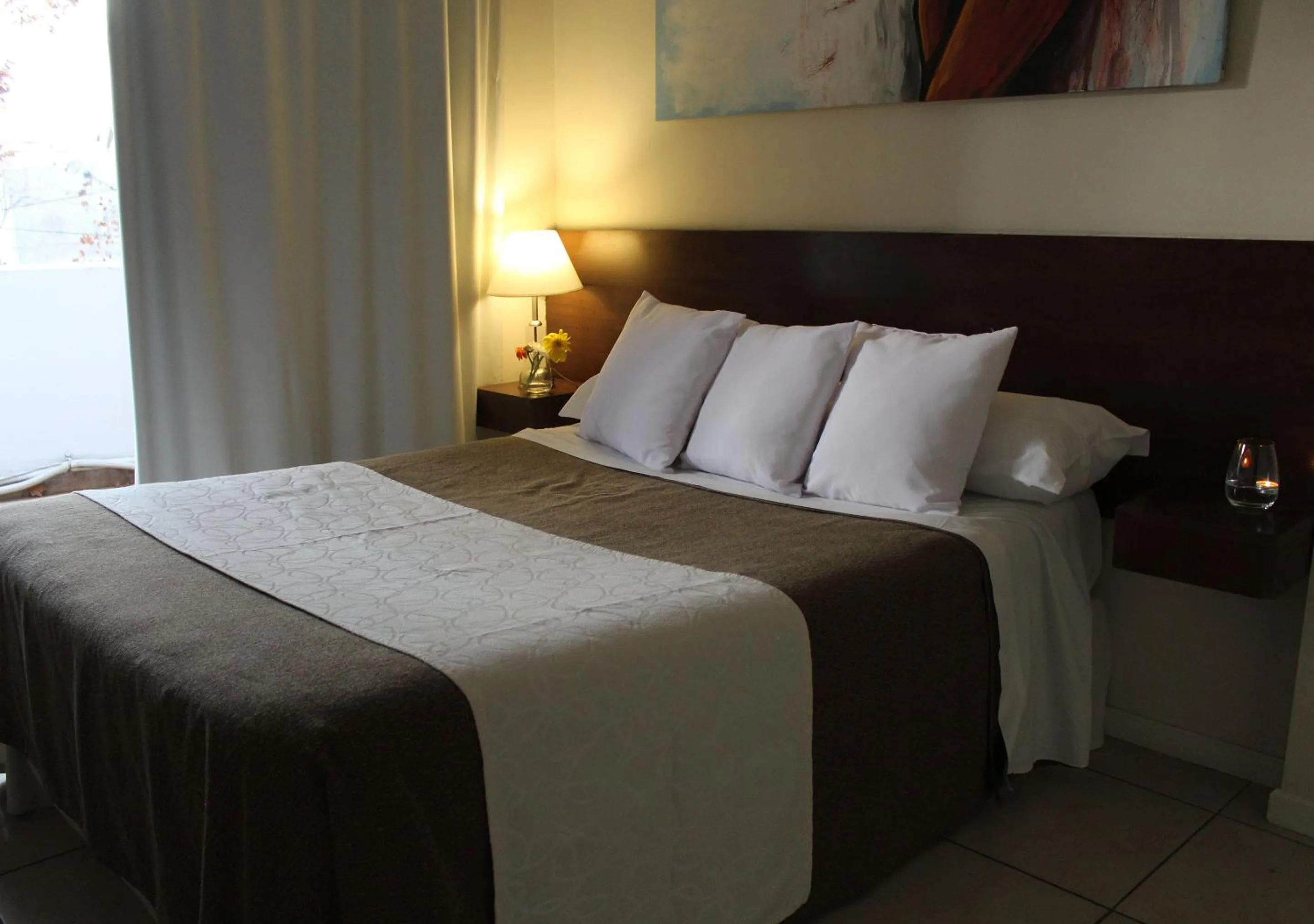 Bed in Uvas Apart Hotel
