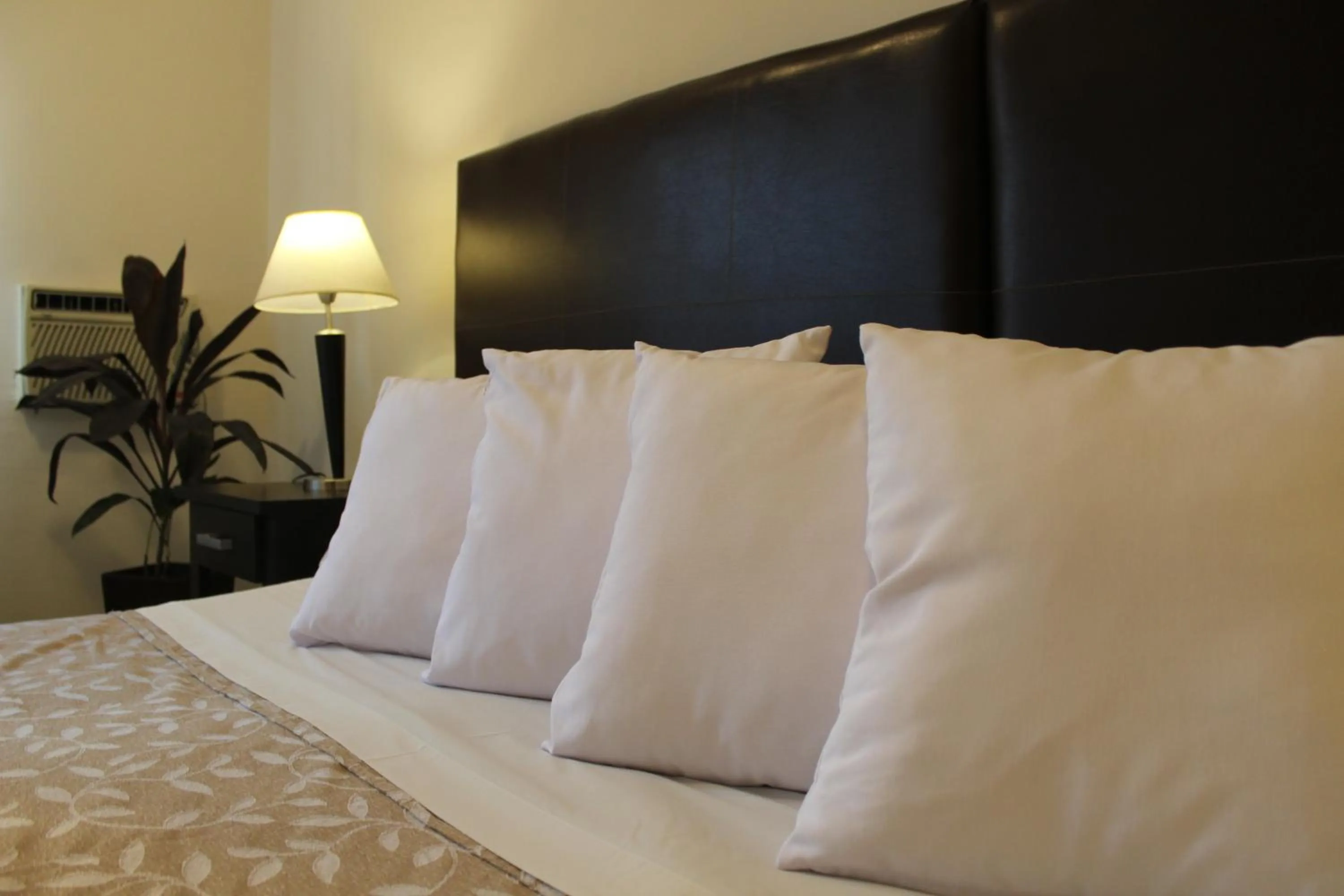 Bed in Uvas Apart Hotel